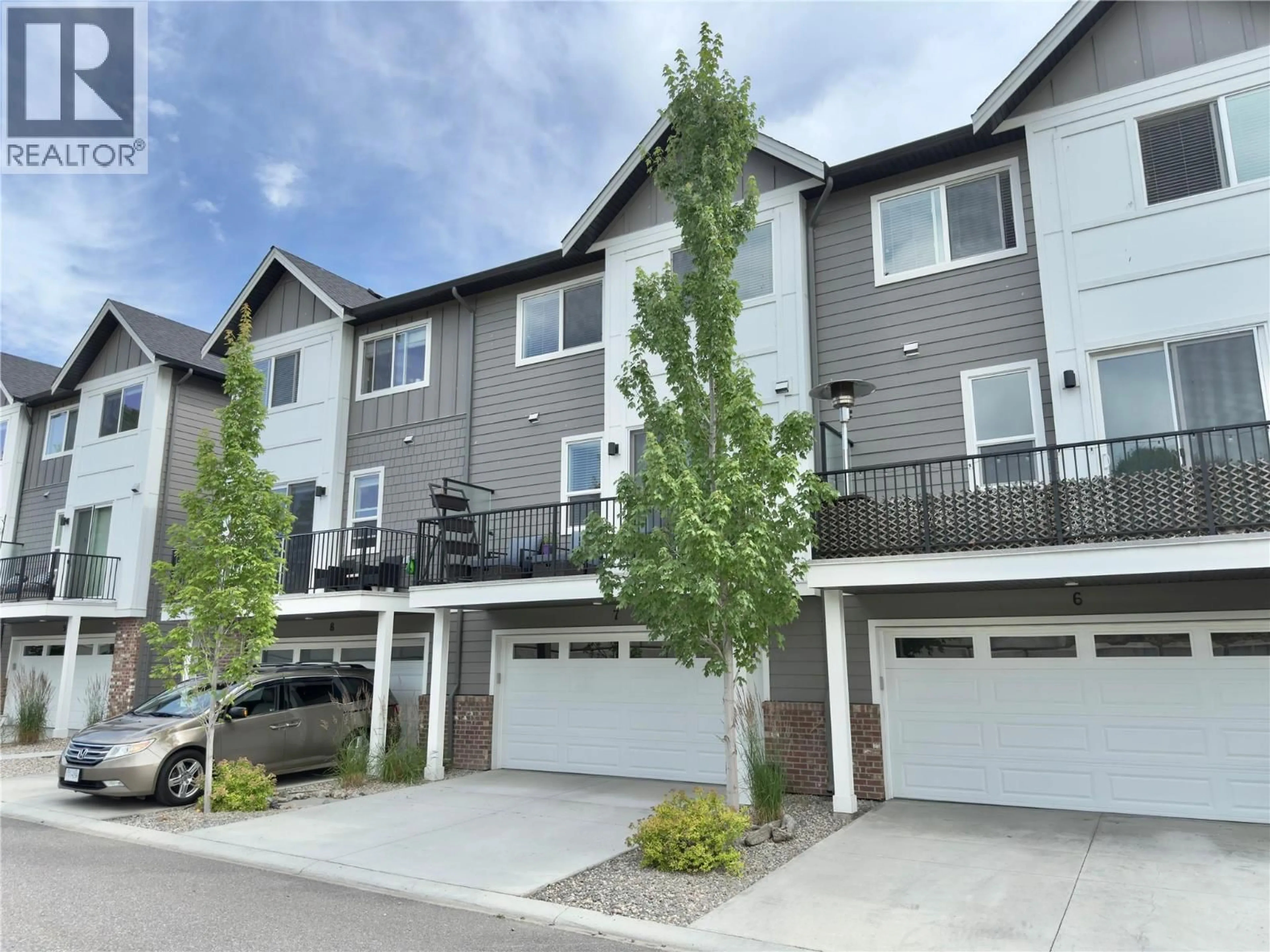 A pic from outside/outdoor area/front of a property/back of a property/a pic from drone, street for 7 - 12075 OCEOLA ROAD, Lake Country British Columbia V4V0A7