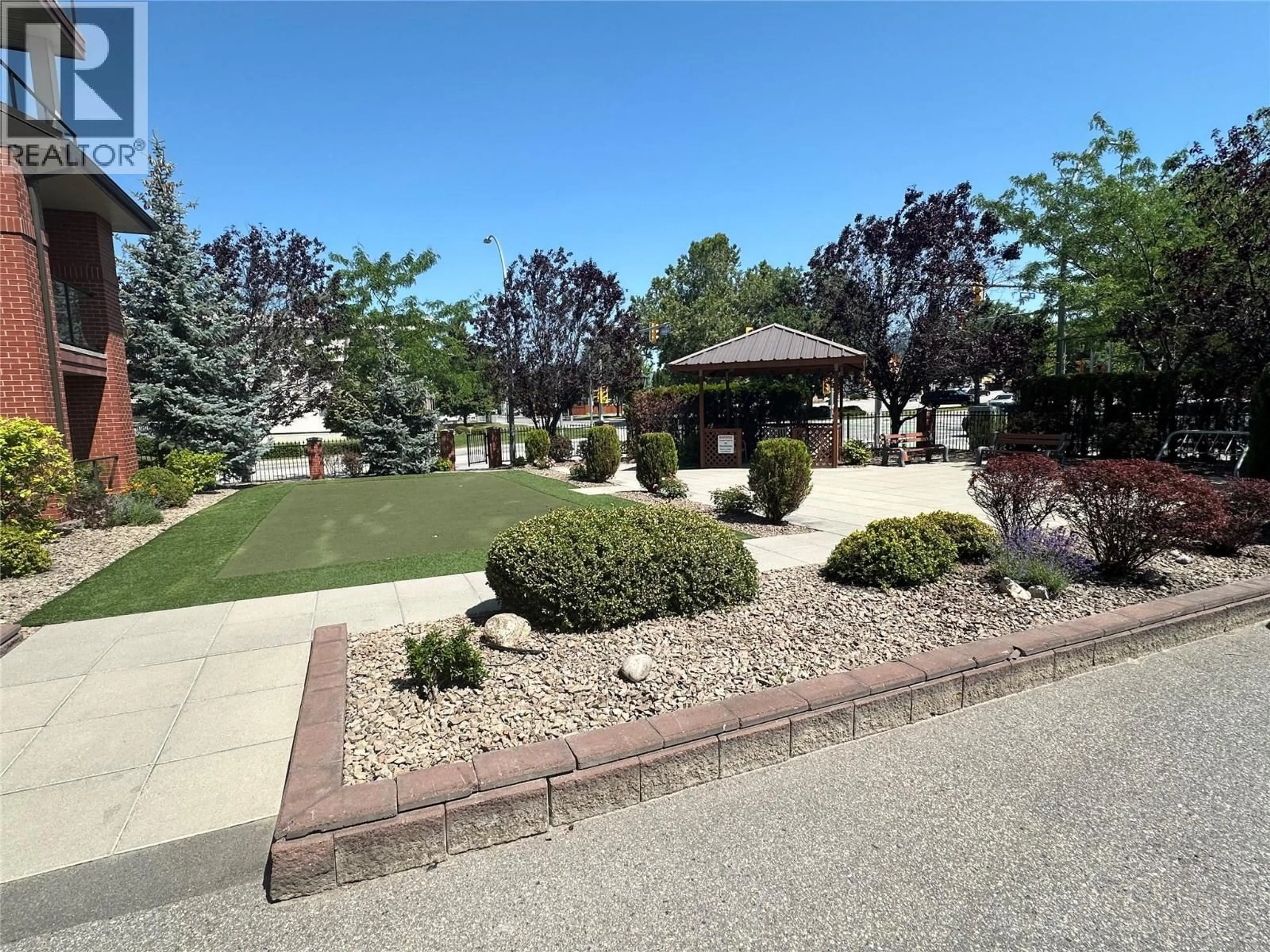 A pic from outside/outdoor area/front of a property/back of a property/a pic from drone, street for 205 - 2113 ATKINSON STREET, Penticton British Columbia V2A8R5