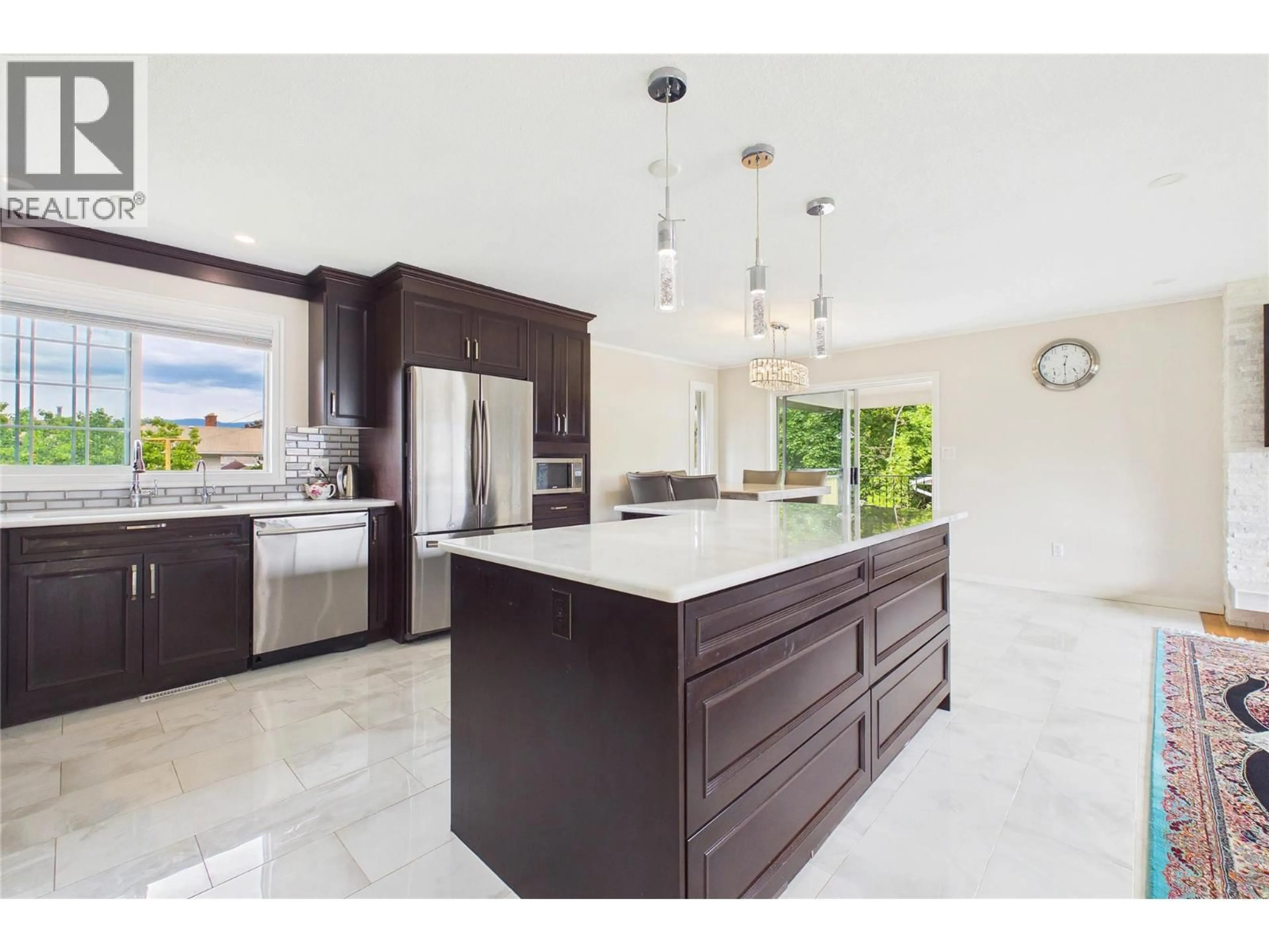 Contemporary kitchen, ceramic/tile floor for 610 ZIPRICK ROAD, Kelowna British Columbia V1X5R5