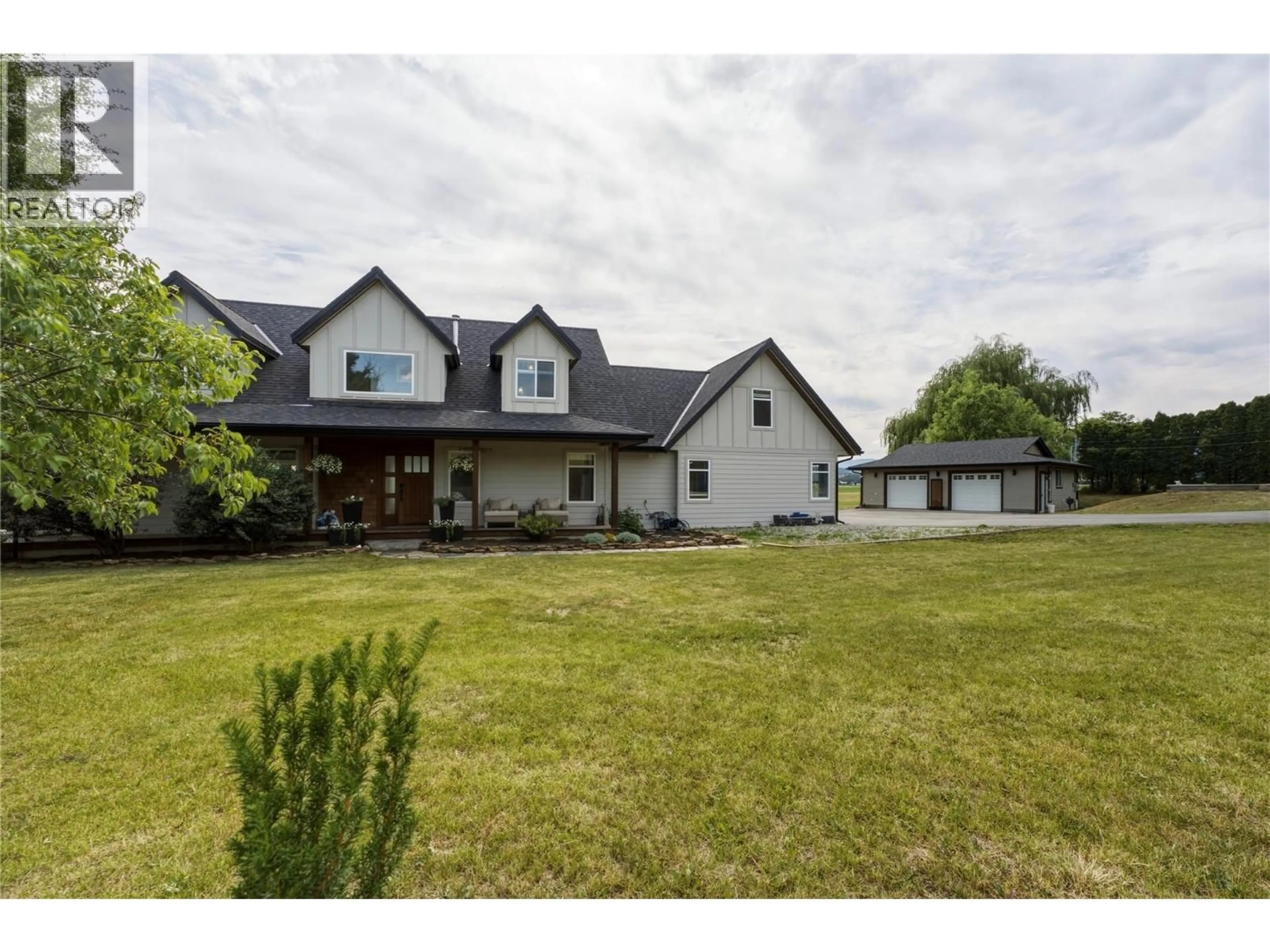 A pic from outside/outdoor area/front of a property/back of a property/a pic from drone, unknown for 4525 MCLEERY ROAD, Spallumcheen British Columbia V4Y0Y4