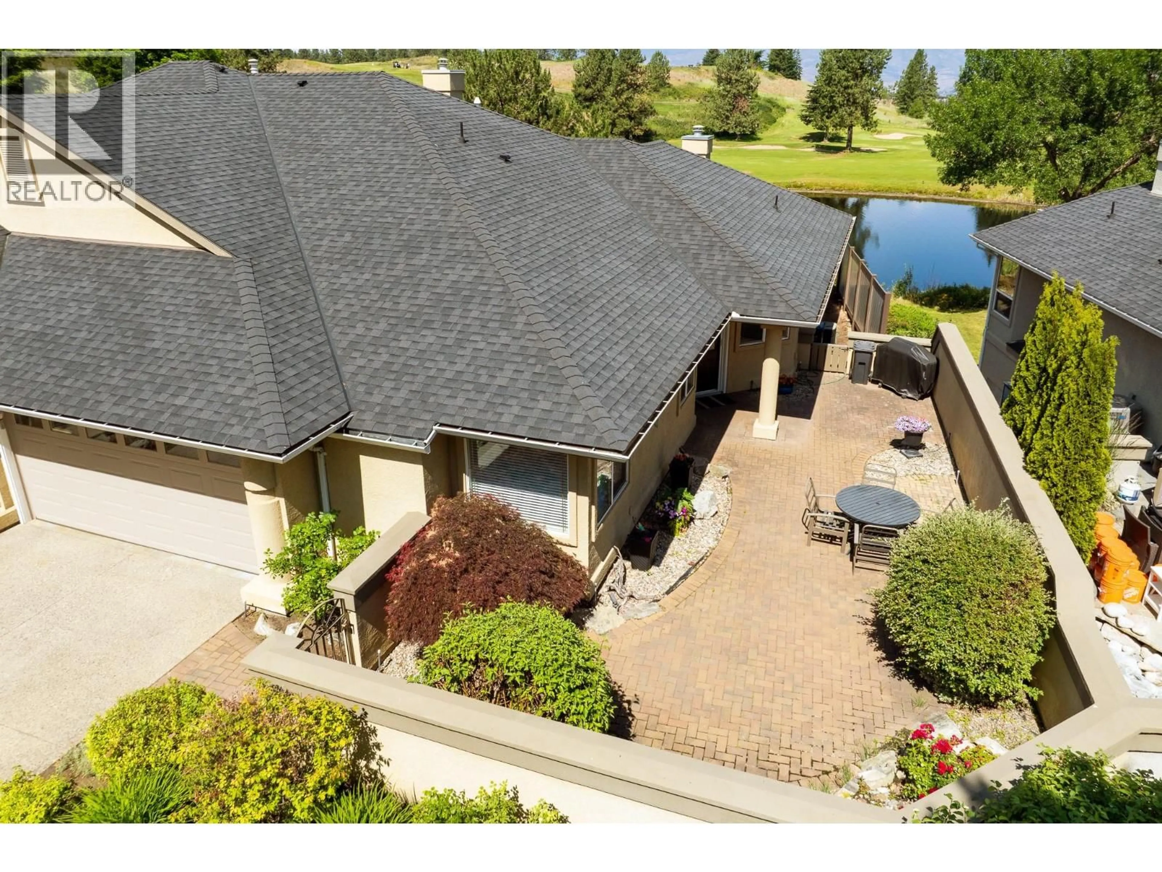 A pic from outside/outdoor area/front of a property/back of a property/a pic from drone, water/lake/river/ocean view for 6 - 3888 GALLAGHERS PINNACLE WAY, Kelowna British Columbia V1W3Z8