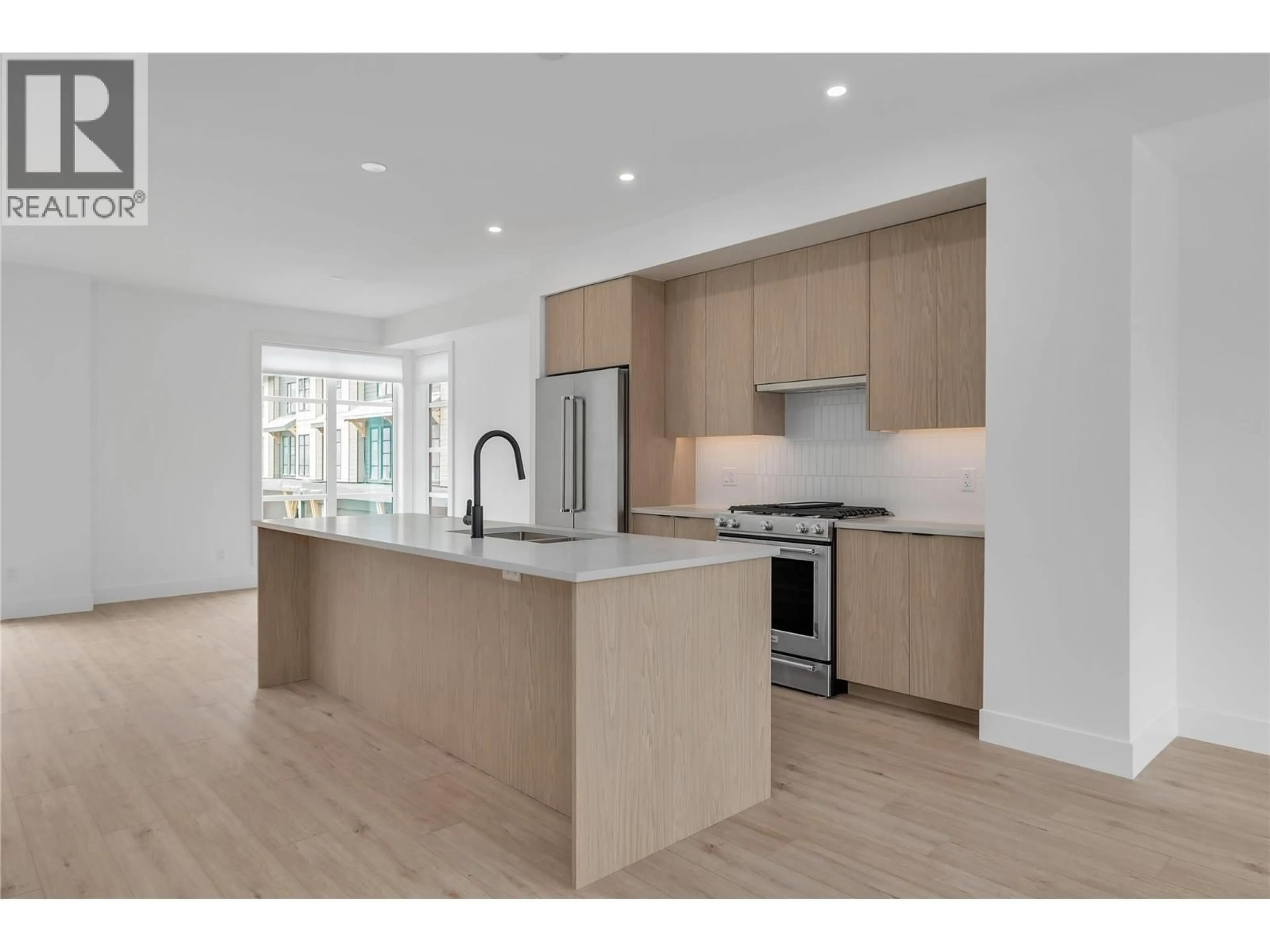 Open concept kitchen, unknown for 132 - 1455 CARA GLEN COURT, Kelowna British Columbia V1V3B8