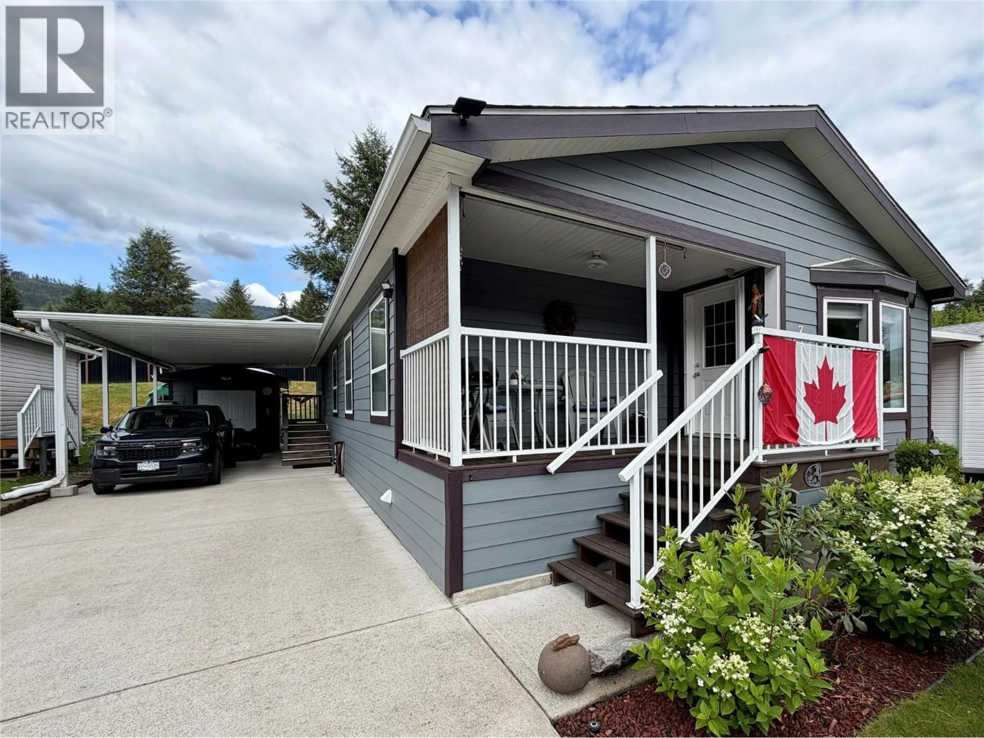 Home with vinyl exterior material, street for 7 - 1500 NEIMI ROAD, Christina Lake British Columbia V0H1E0