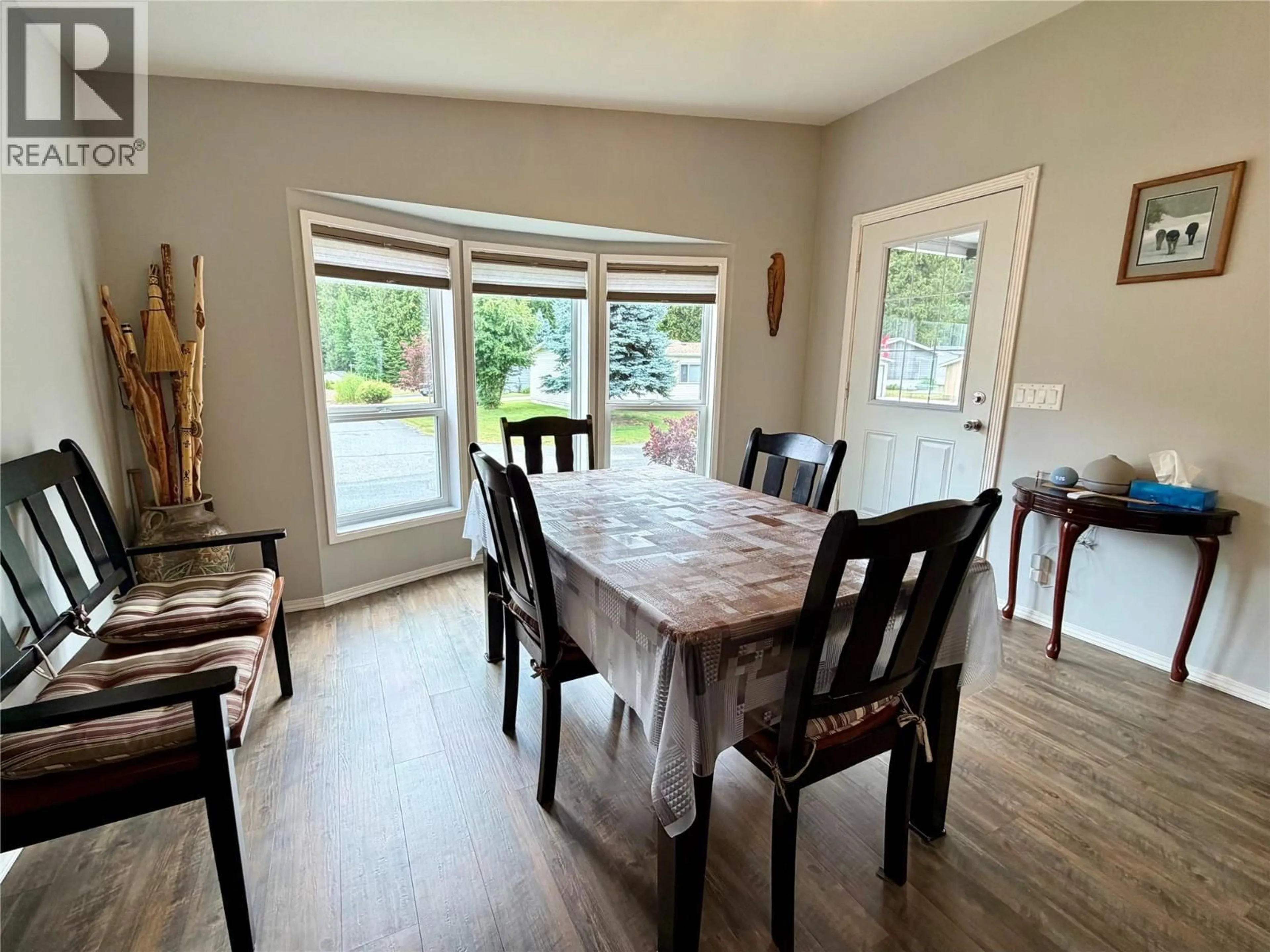 Dining room, wood/laminate floor for 7 - 1500 NEIMI ROAD, Christina Lake British Columbia V0H1E0