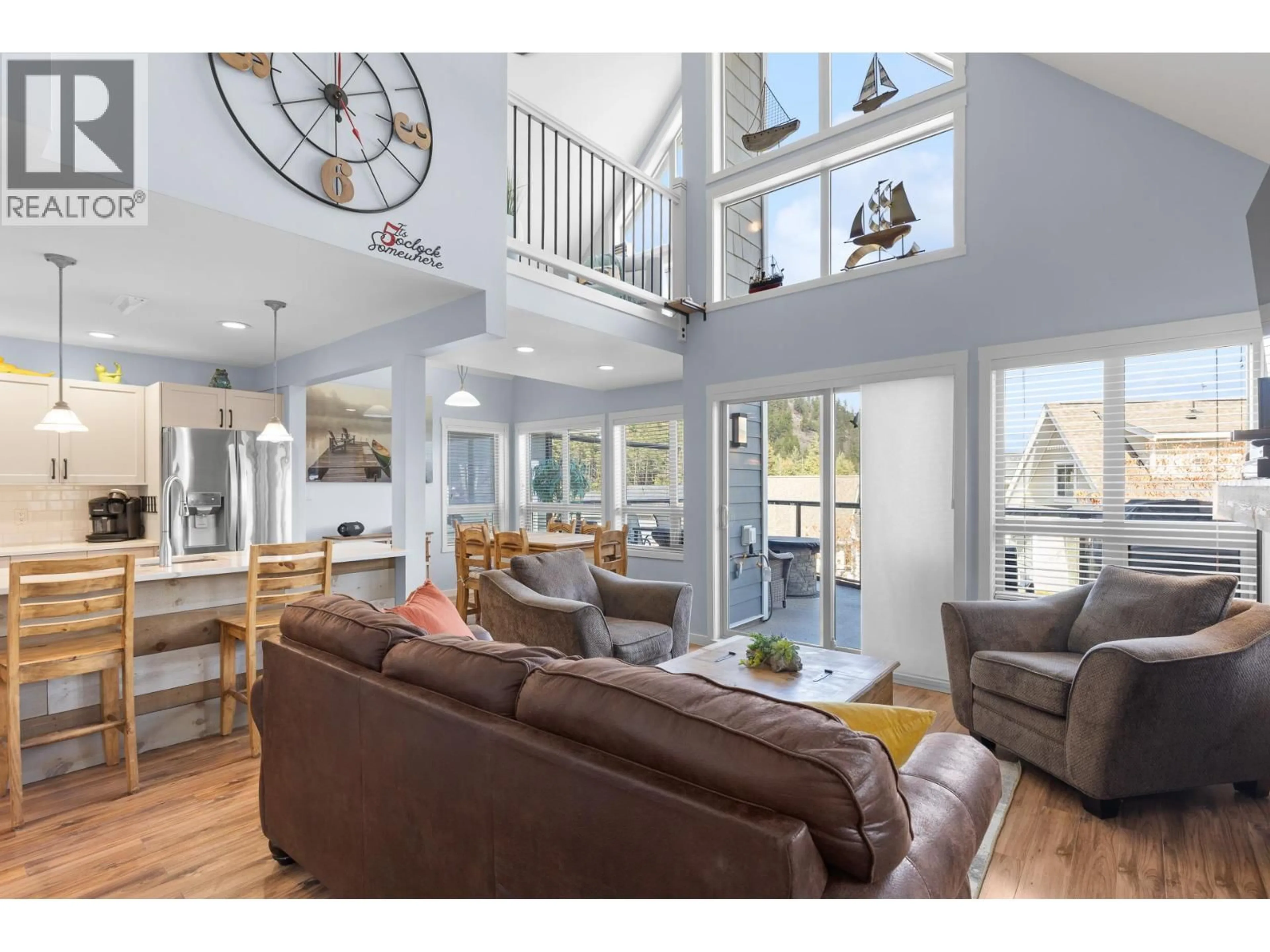 Open concept kitchen, wood/laminate floor for 179 - 6844 SANTIAGO LOOP, Kelowna British Columbia V1Z3R8