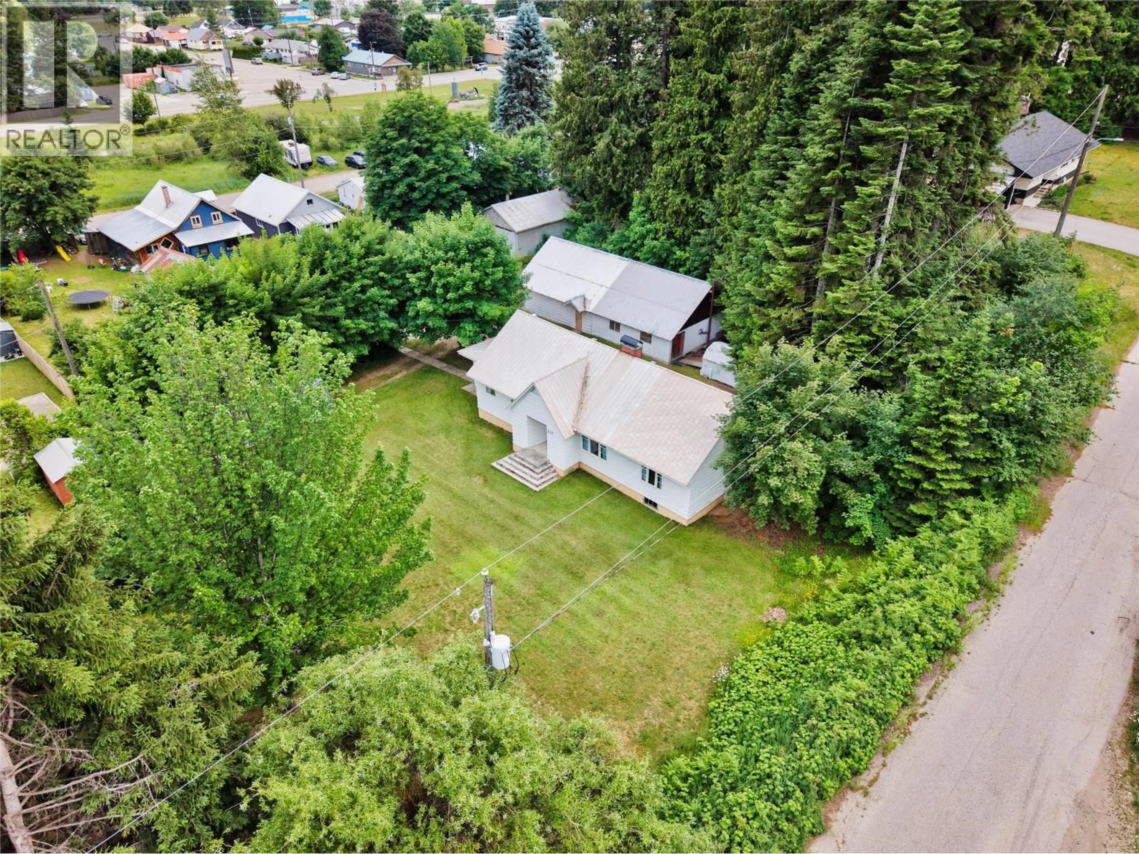 A pic from outside/outdoor area/front of a property/back of a property/a pic from drone, unknown for 211 MACLURE AVENUE, Salmo British Columbia V0G1Z0