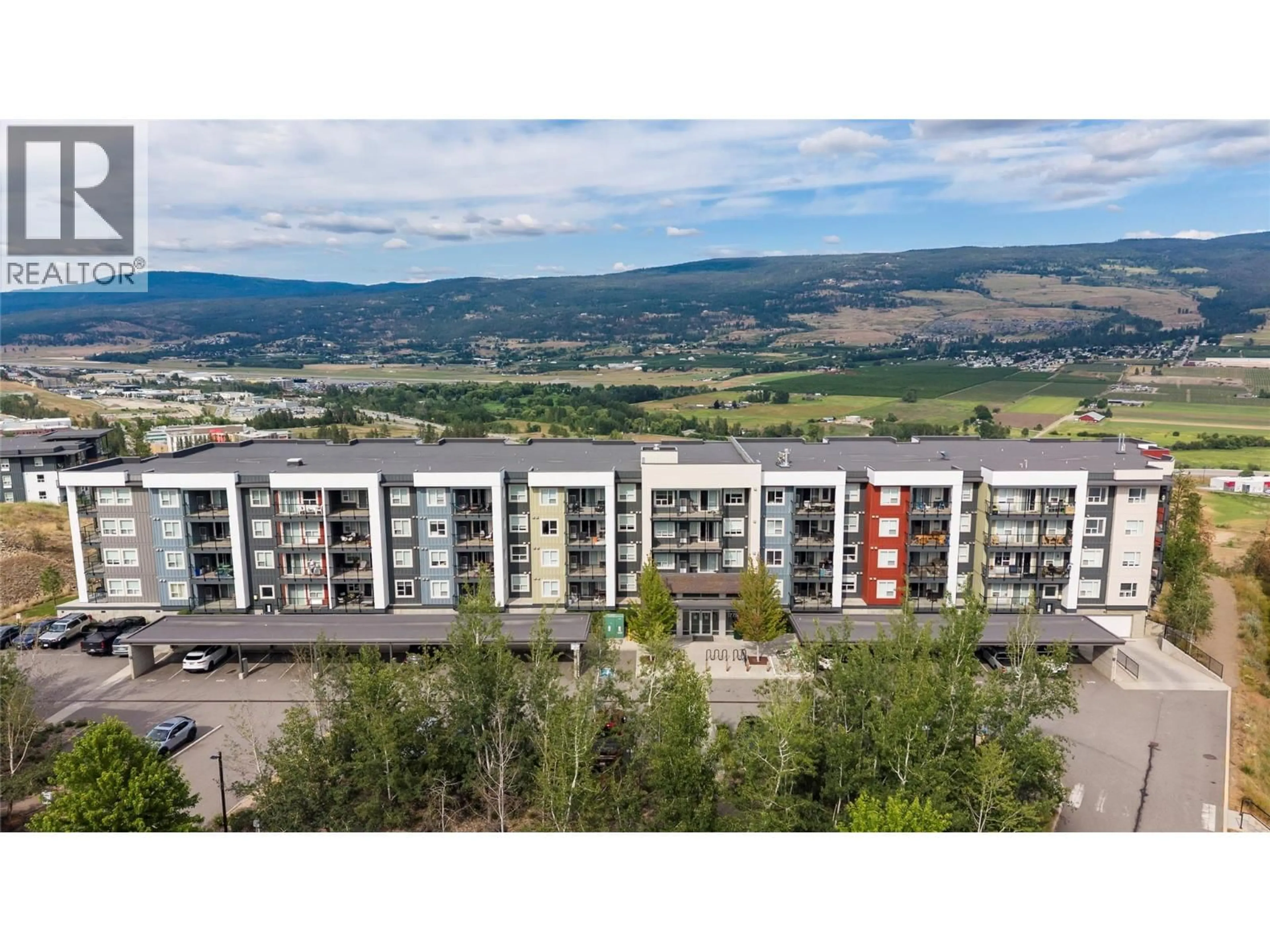 A pic from outside/outdoor area/front of a property/back of a property/a pic from drone, mountain view for PH21 - 775 ACADEMY WAY, Kelowna British Columbia V1V0A5