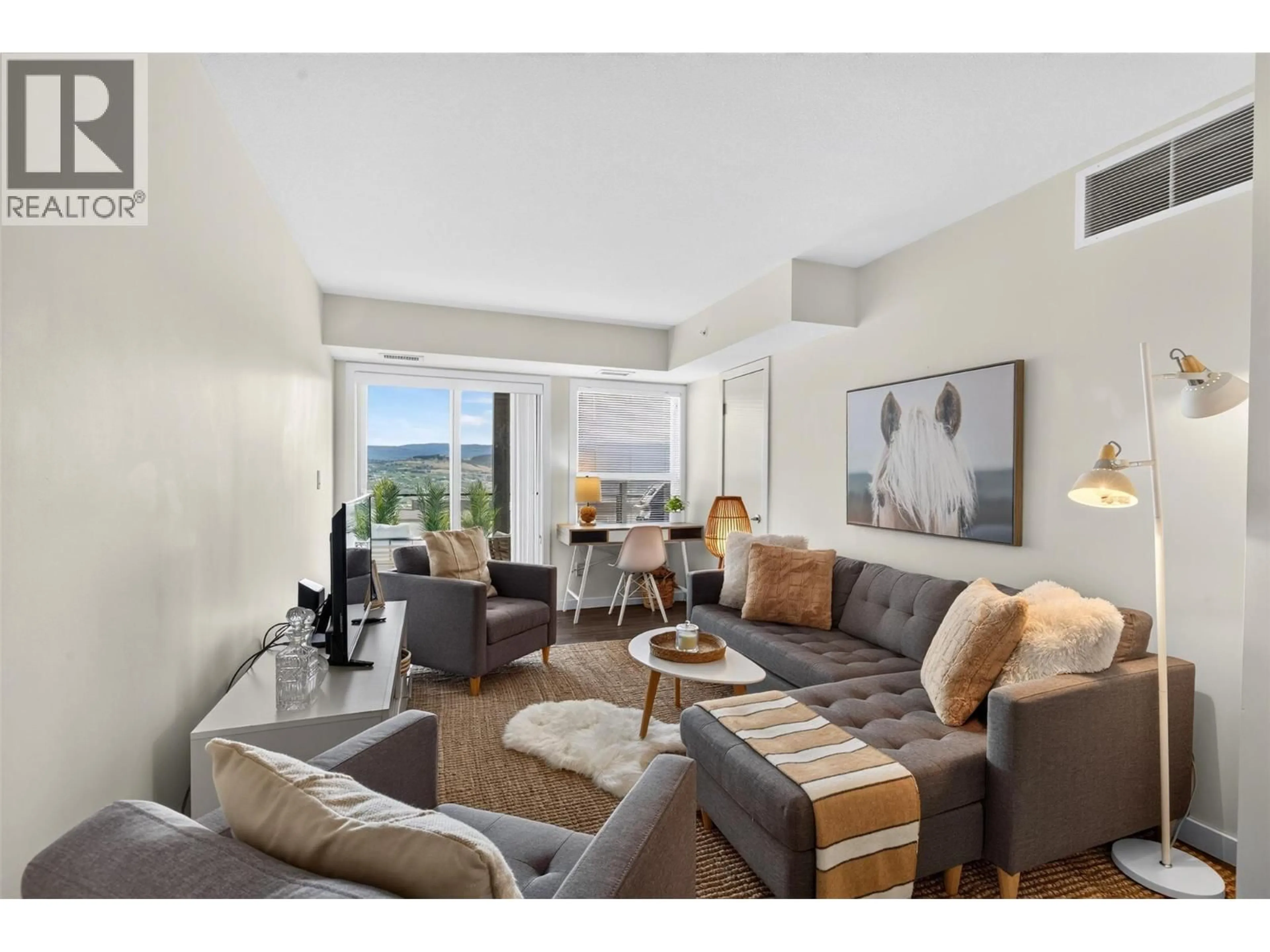 Living room with furniture, unknown for PH21 - 775 ACADEMY WAY, Kelowna British Columbia V1V0A5