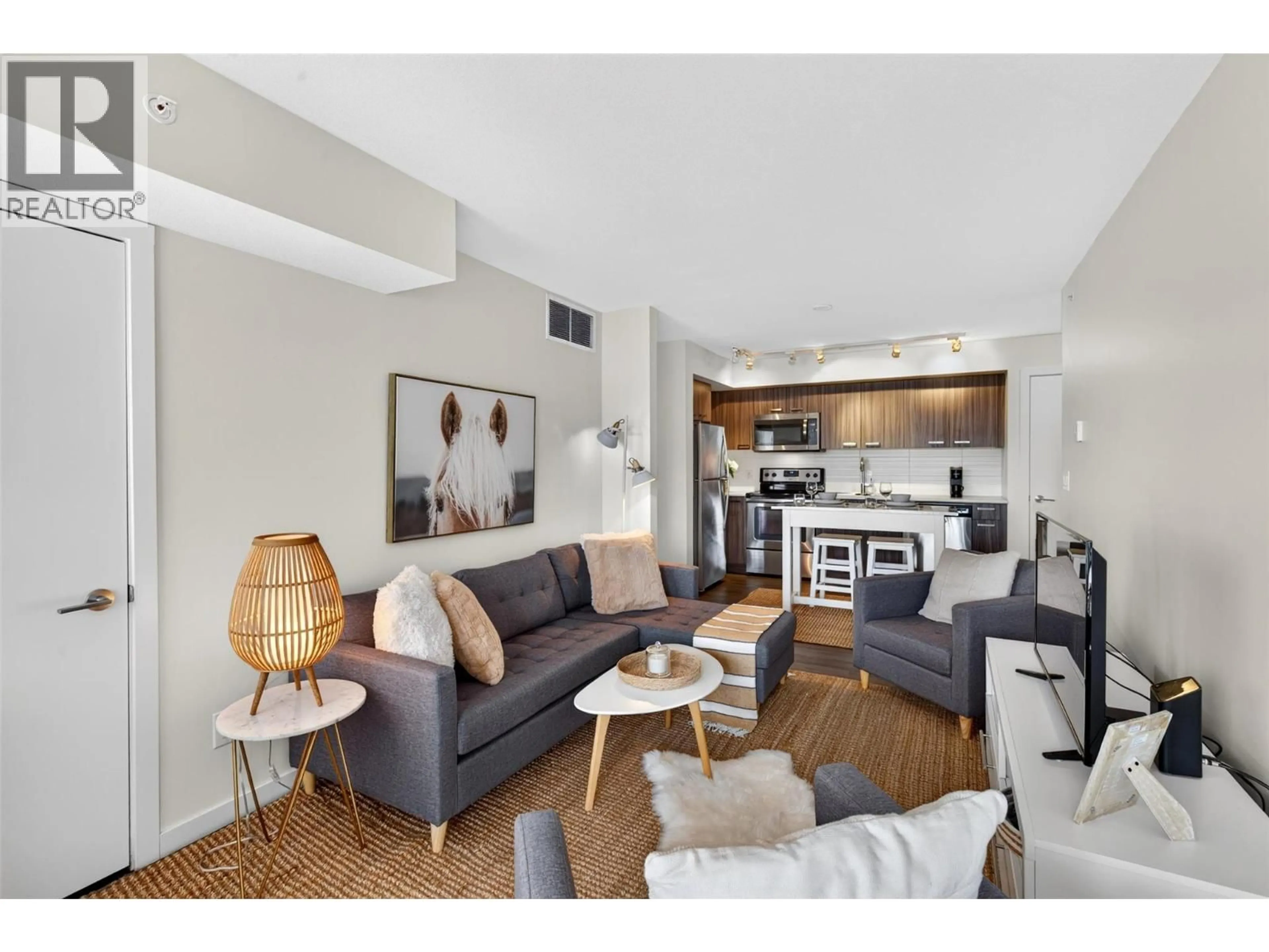 Living room with furniture, unknown for PH21 - 775 ACADEMY WAY, Kelowna British Columbia V1V0A5