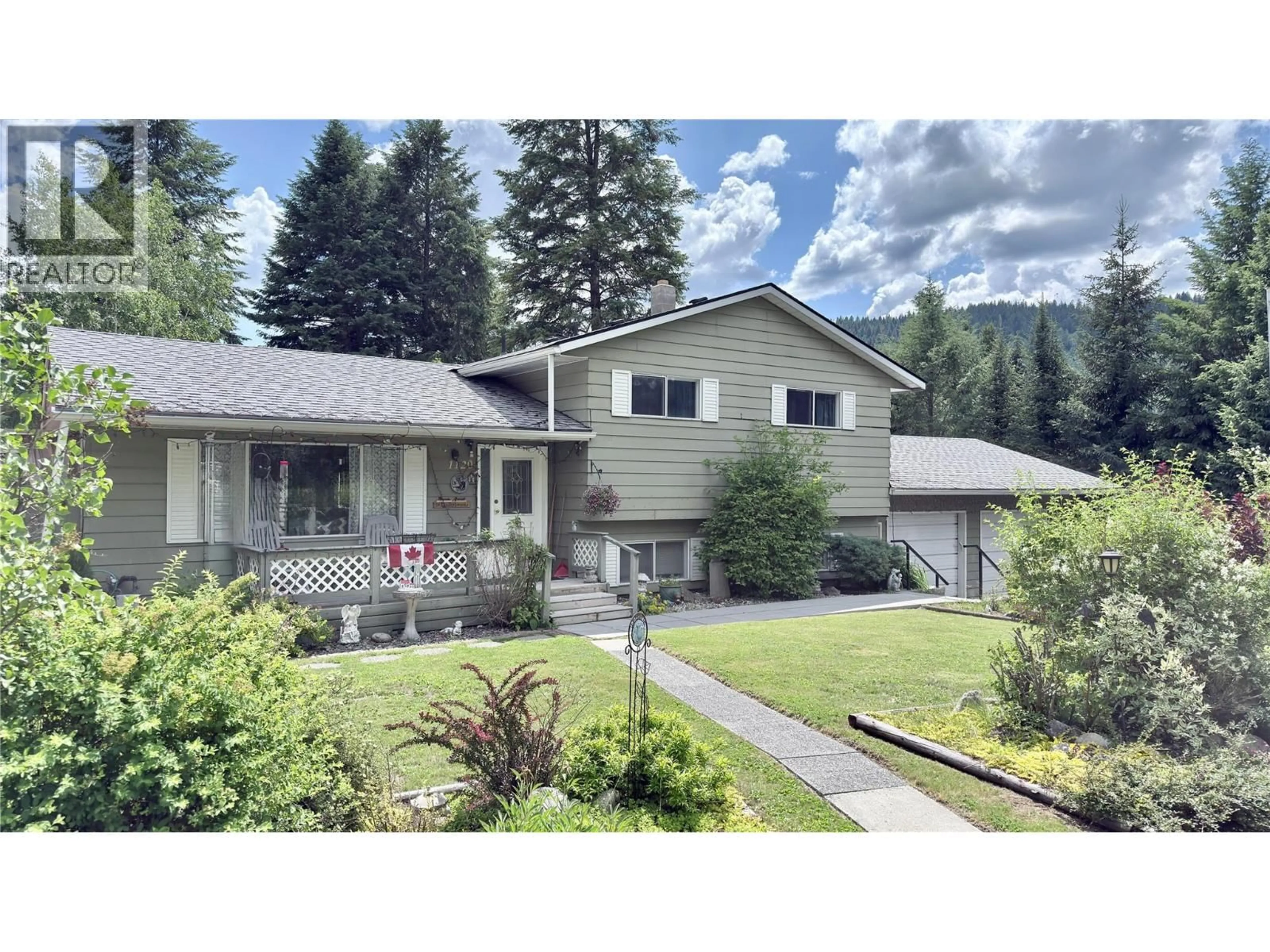 Home with vinyl exterior material, street for 1120 GOWRIE STREET, Greenwood British Columbia V0H1J0