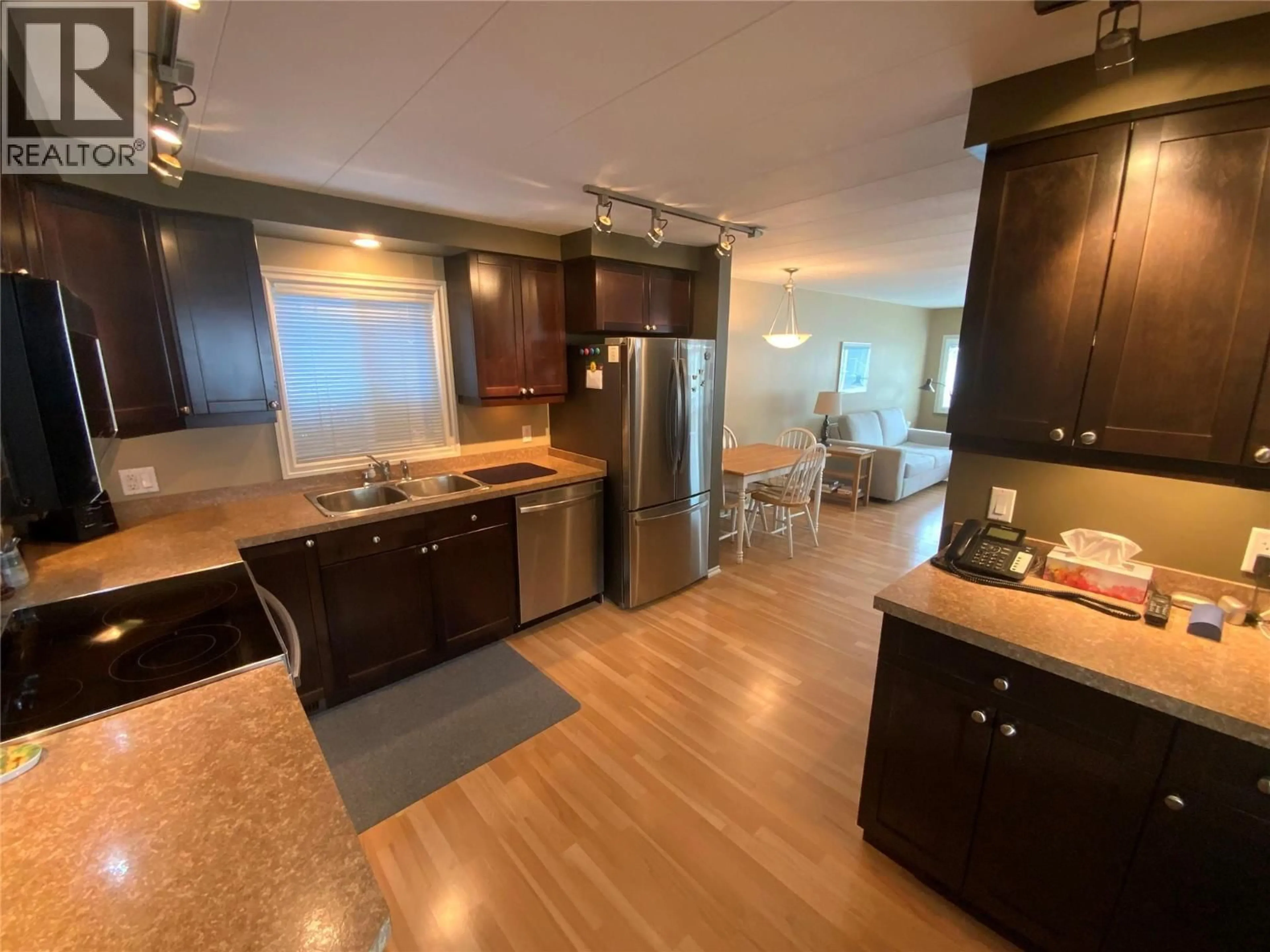 Open concept kitchen, unknown for 106 - 3105 SOUTH MAIN STREET, Penticton British Columbia V2A7H1