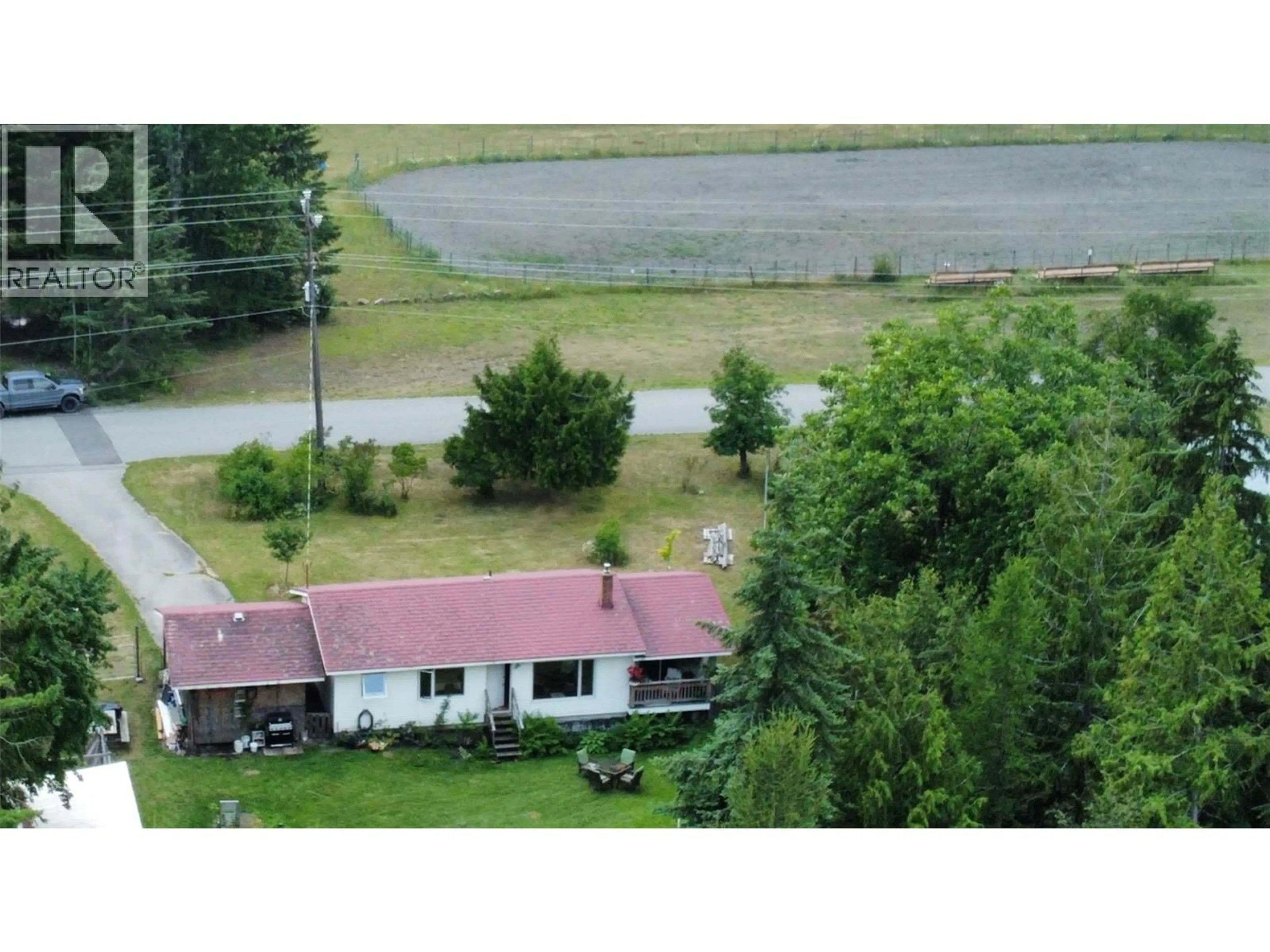 A pic from outside/outdoor area/front of a property/back of a property/a pic from drone, water/lake/river/ocean view for 550 ARENA AVENUE, Kaslo British Columbia V0G1M0