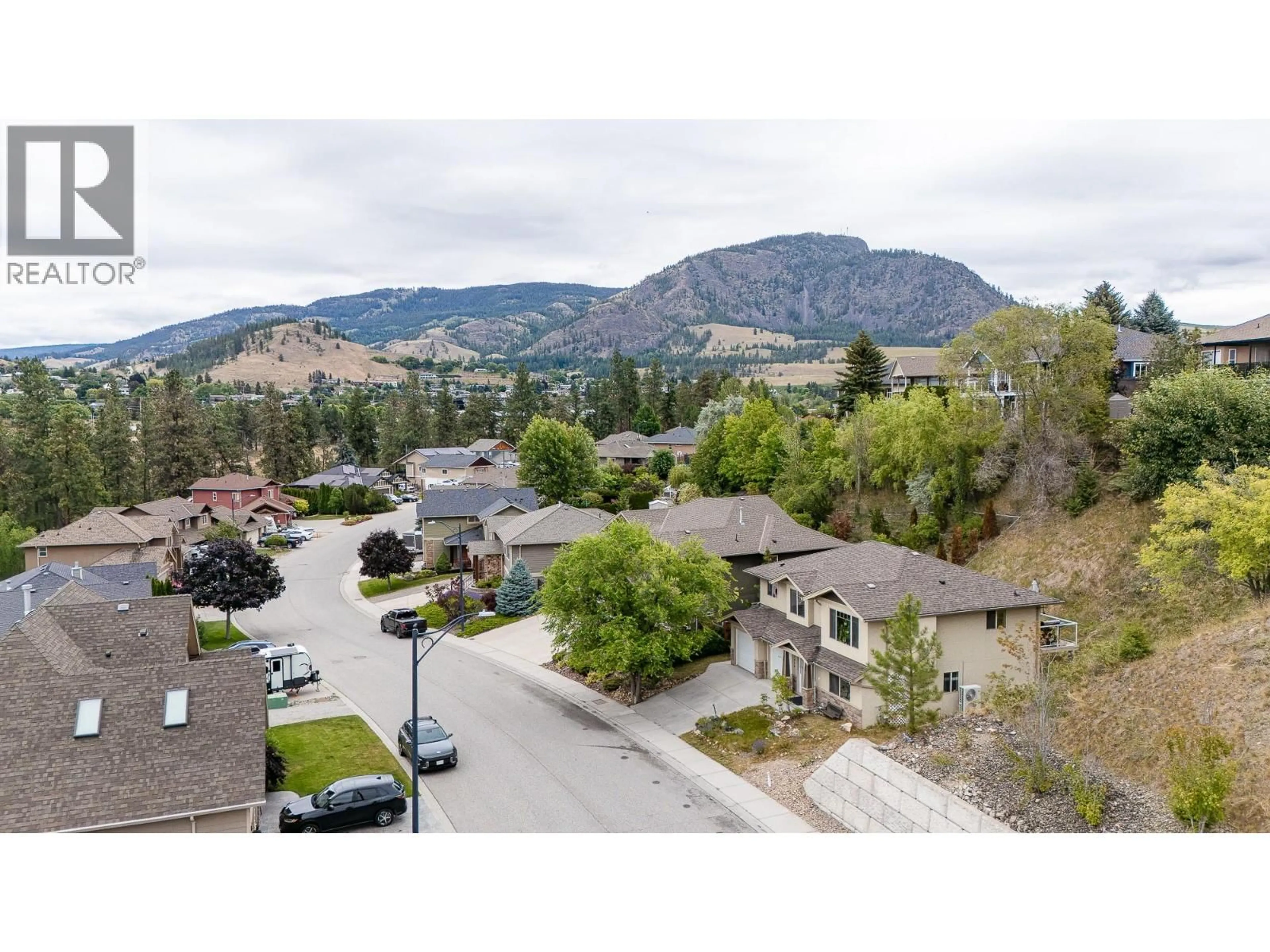 A pic from outside/outdoor area/front of a property/back of a property/a pic from drone, mountain view for 1469 KLOPPENBURG ROAD, Kelowna British Columbia V1P1N6