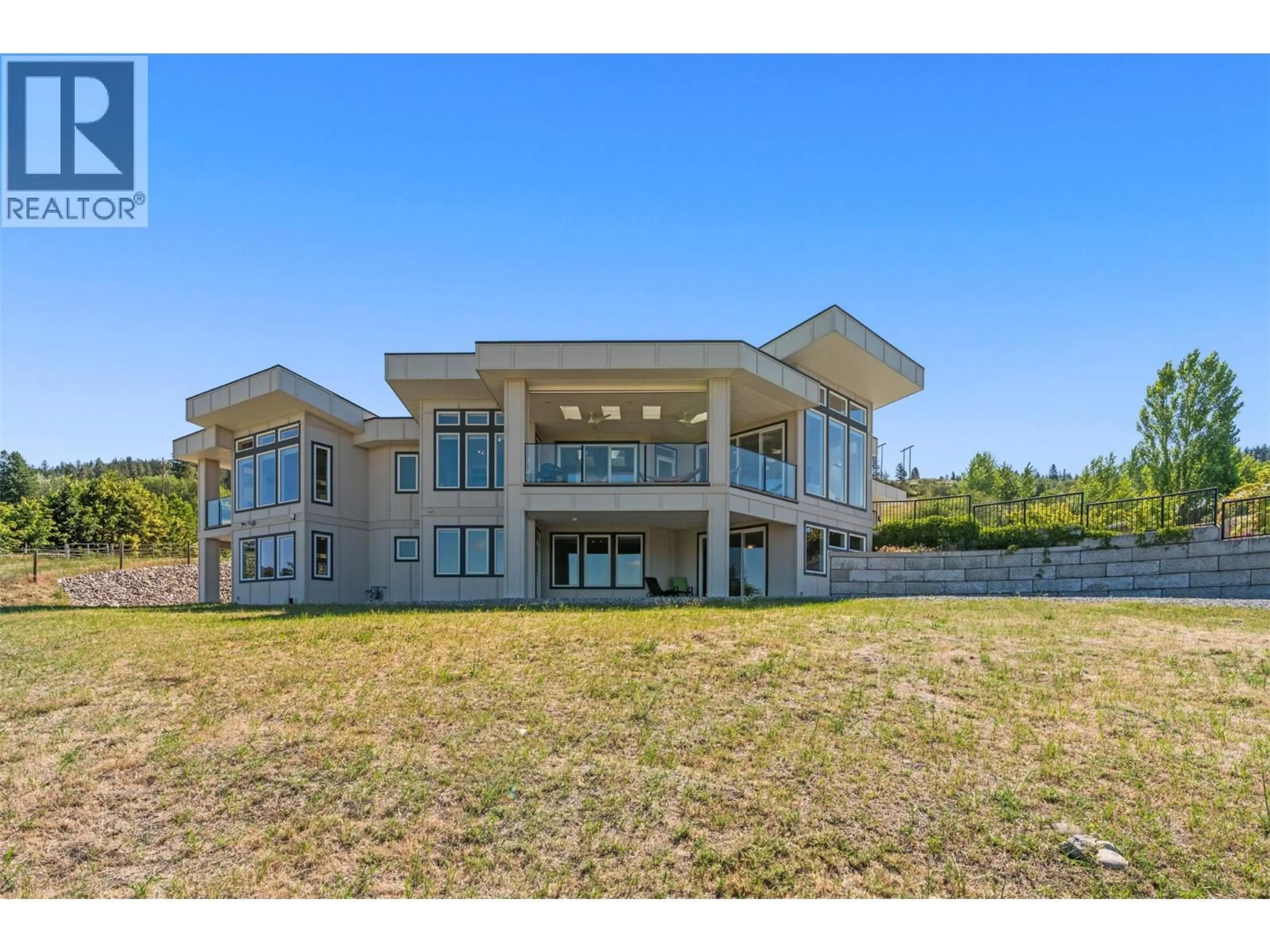 A pic from outside/outdoor area/front of a property/back of a property/a pic from drone, unknown for 7697 BAKER HOGG ROAD, Vernon British Columbia V1B3S3