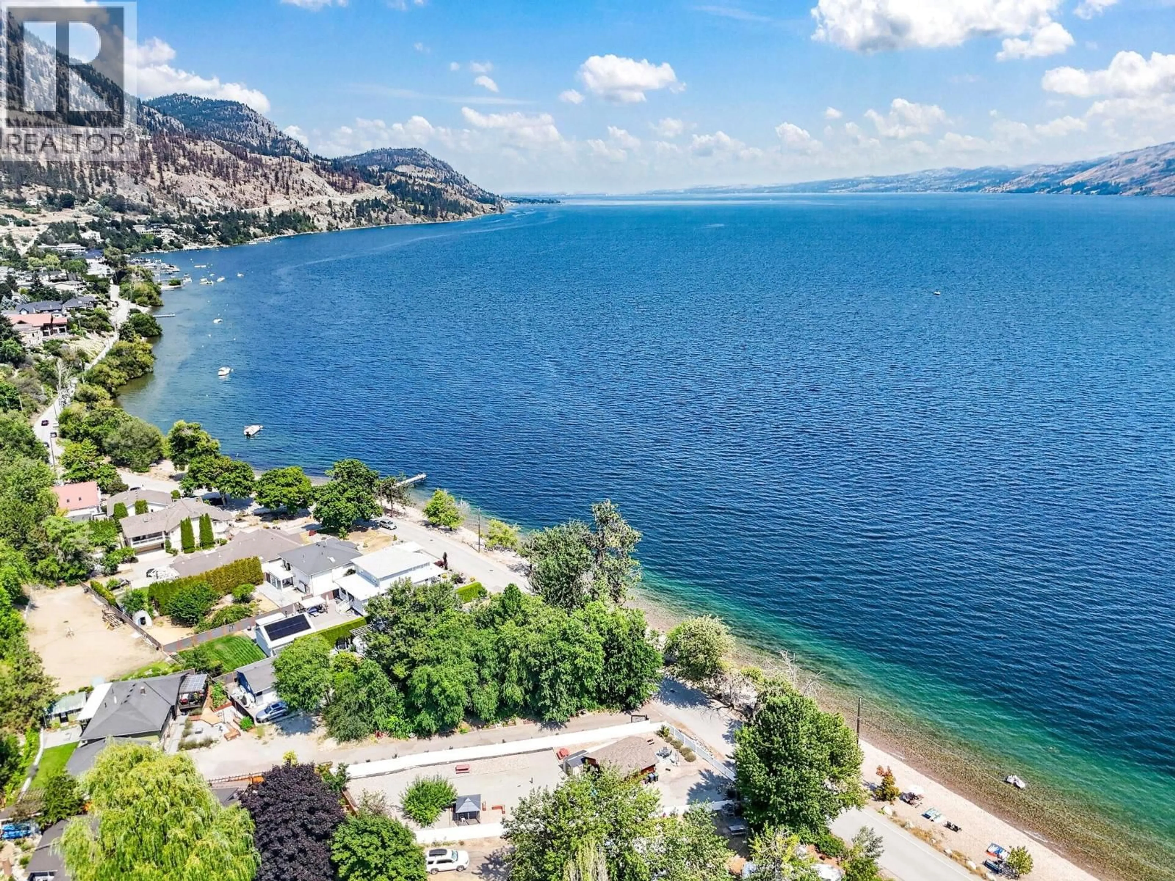 A pic from outside/outdoor area/front of a property/back of a property/a pic from drone, water/lake/river/ocean view for 3922 BEACH AVENUE, Peachland British Columbia V0H1X1