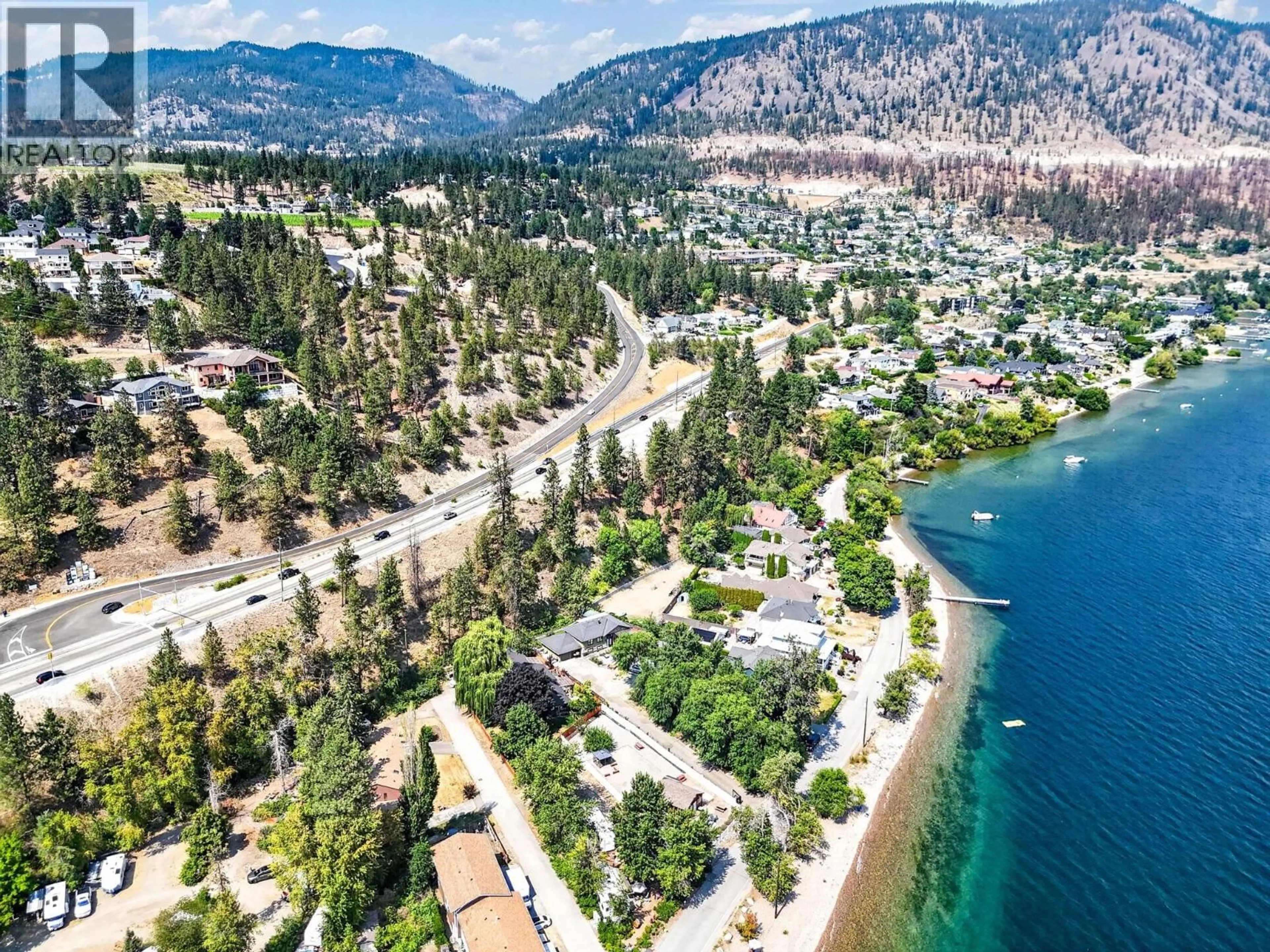 A pic from outside/outdoor area/front of a property/back of a property/a pic from drone, water/lake/river/ocean view for 3922 BEACH AVENUE, Peachland British Columbia V0H1X1