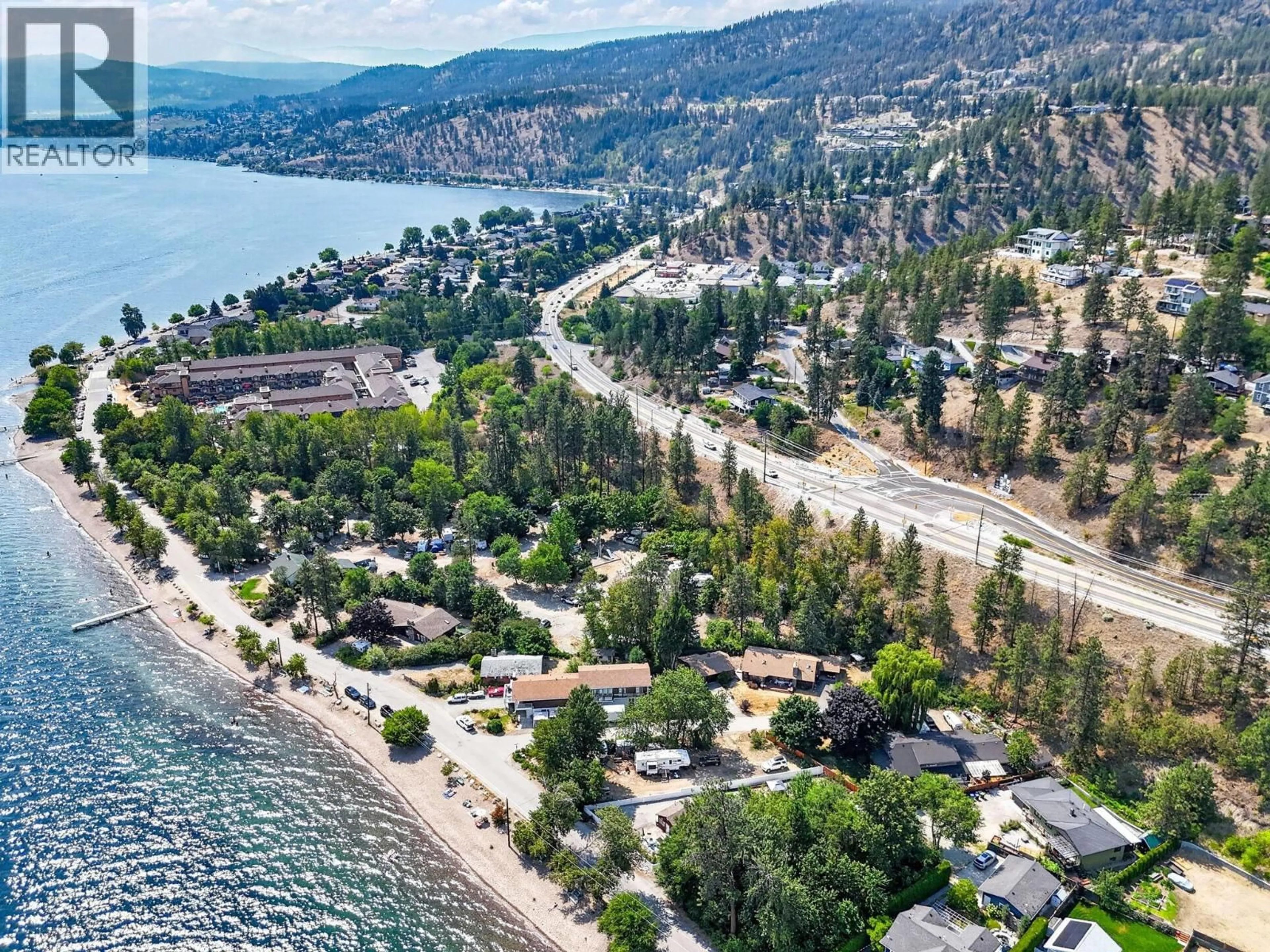 A pic from outside/outdoor area/front of a property/back of a property/a pic from drone, water/lake/river/ocean view for 3922 BEACH AVENUE, Peachland British Columbia V0H1X1