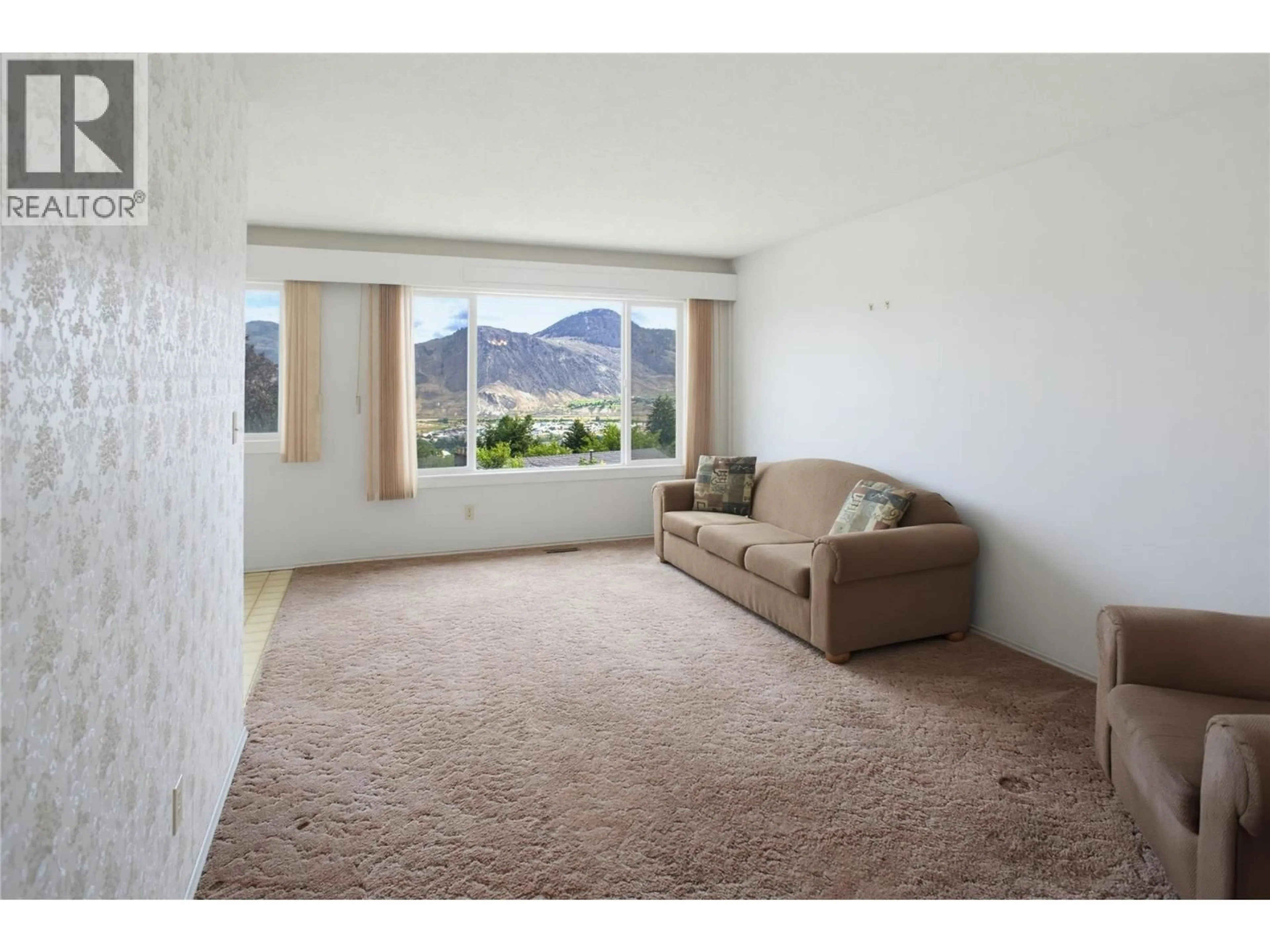 Living room with furniture, carpet floor for 217 MCGILL ROAD, Kamloops British Columbia V2C1M2