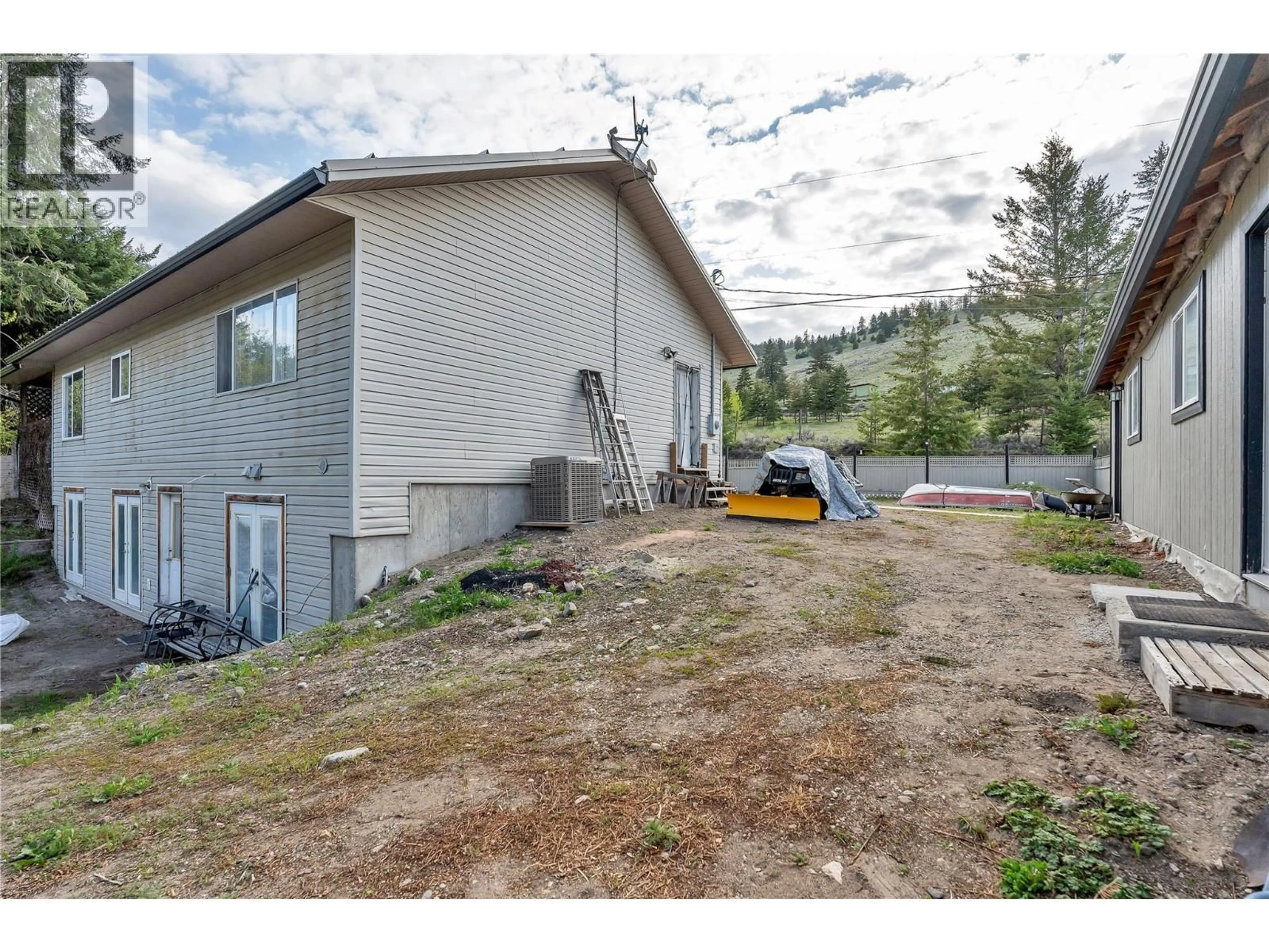 A pic from outside/outdoor area/front of a property/back of a property/a pic from drone, street for 523 GRAND ORO ROAD, Kaleden British Columbia V0H1K0