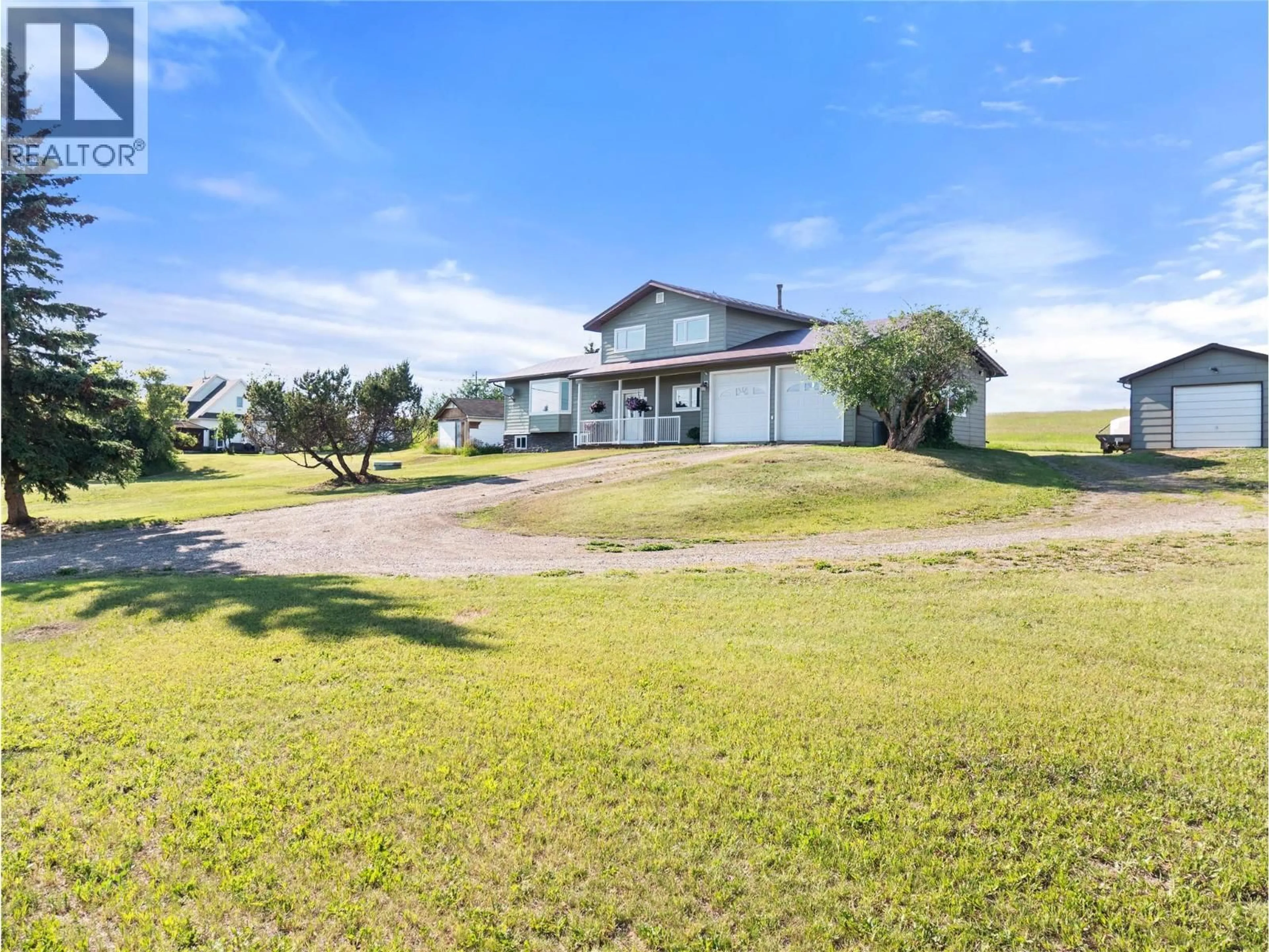 A pic from outside/outdoor area/front of a property/back of a property/a pic from drone, unknown for 1110 210 ROAD, Dawson Creek British Columbia V1G4E8
