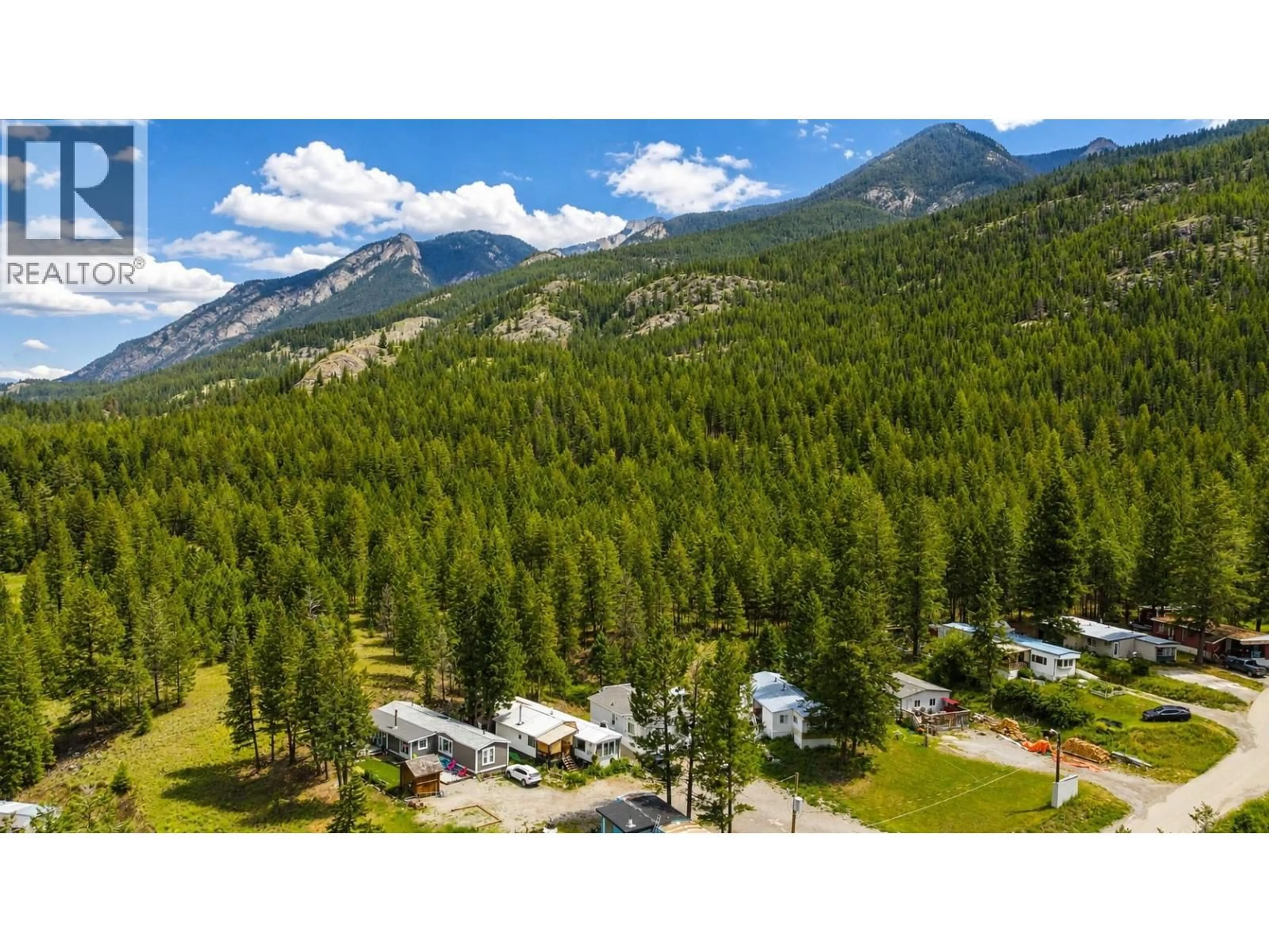 A pic from outside/outdoor area/front of a property/back of a property/a pic from drone, mountain view for 28 - 8634 93/95 HIGHWAY, Radium Hot Springs British Columbia V0A1M0