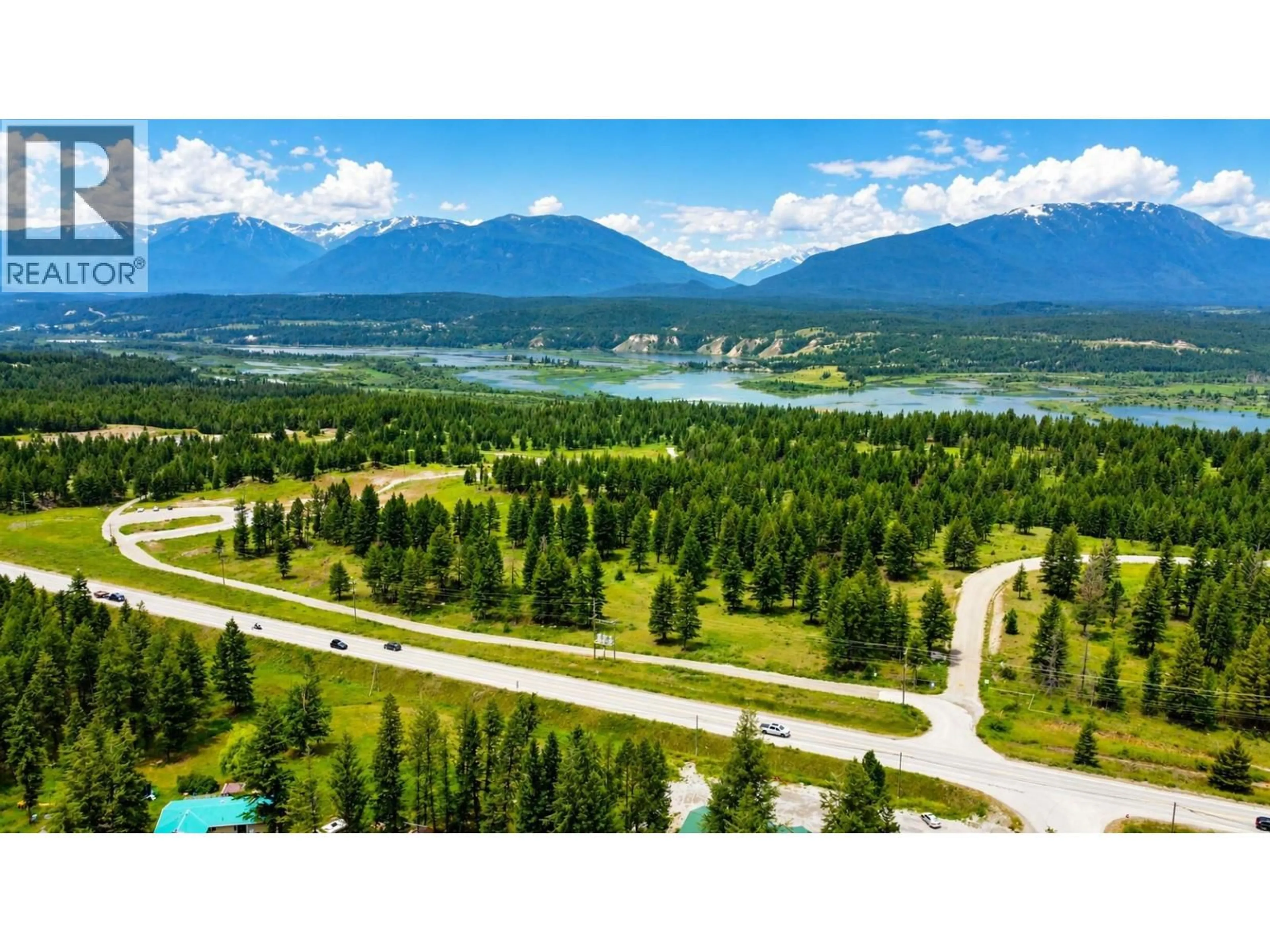 A pic from outside/outdoor area/front of a property/back of a property/a pic from drone, mountain view for 28 - 8634 93/95 HIGHWAY, Radium Hot Springs British Columbia V0A1M0