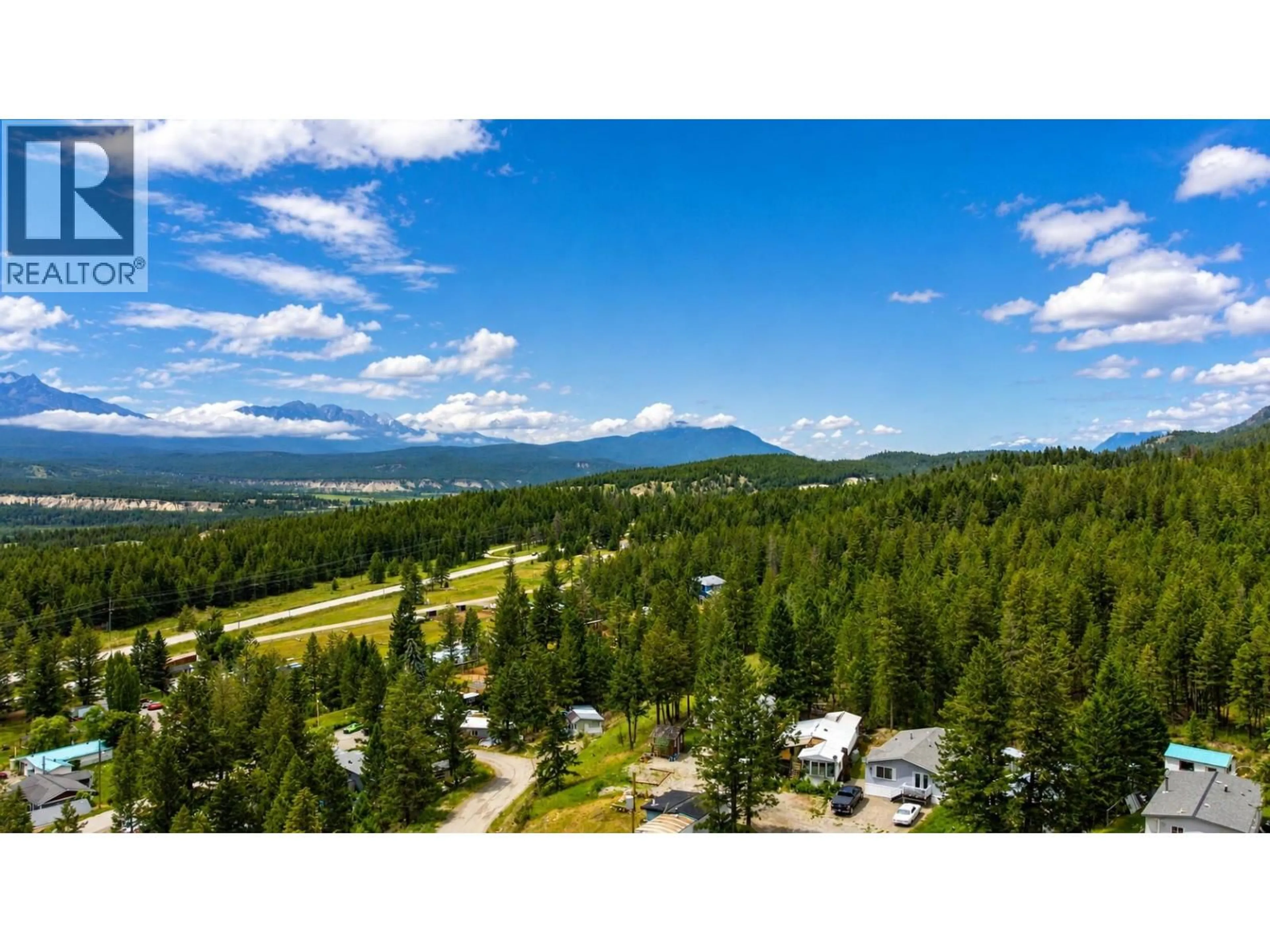 A pic from outside/outdoor area/front of a property/back of a property/a pic from drone, mountain view for 28 - 8634 93/95 HIGHWAY, Radium Hot Springs British Columbia V0A1M0