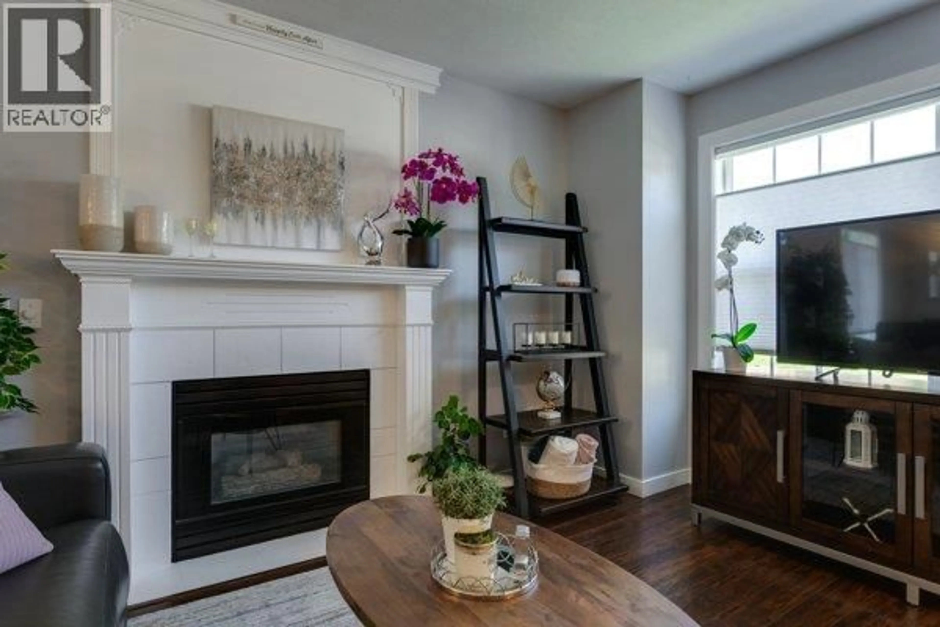Living room with furniture, wood/laminate floor for 1114 - 2440 OLD OKANAGAN HIGHWAY, West Kelowna British Columbia V4T1X6