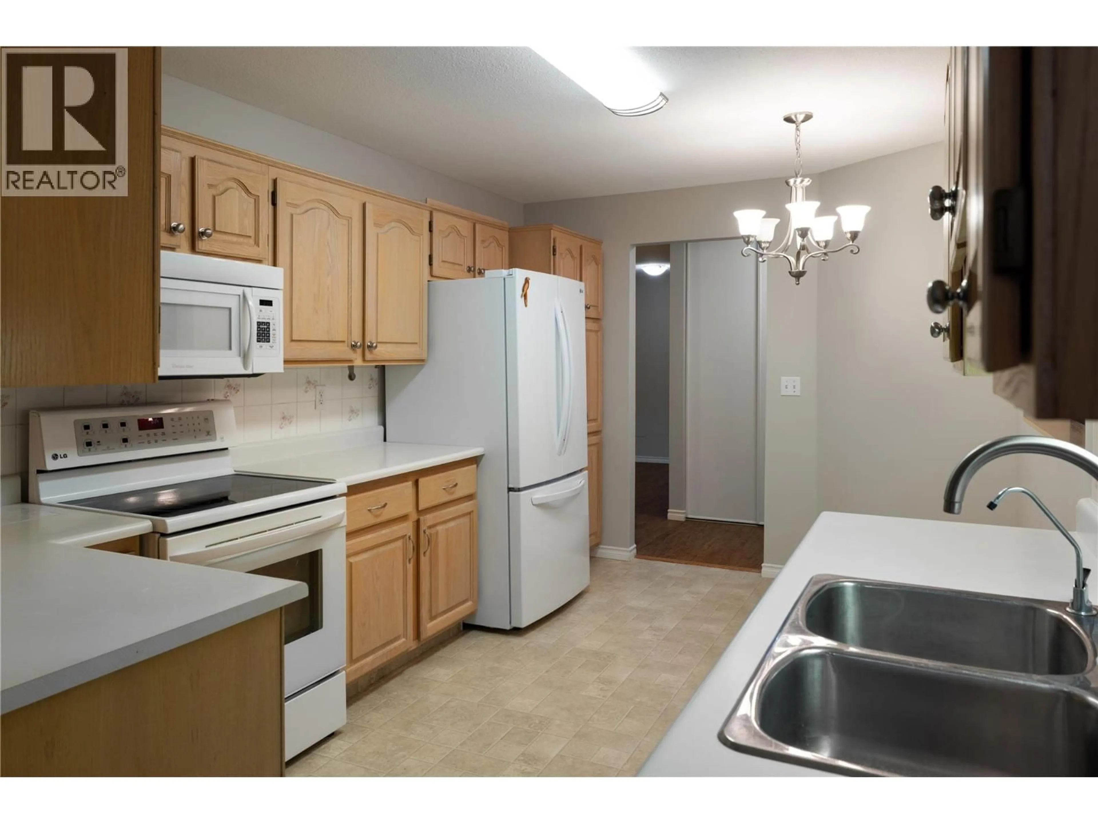Standard kitchen, unknown for 210 - 1329 KLO ROAD, Kelowna British Columbia V1W3N9