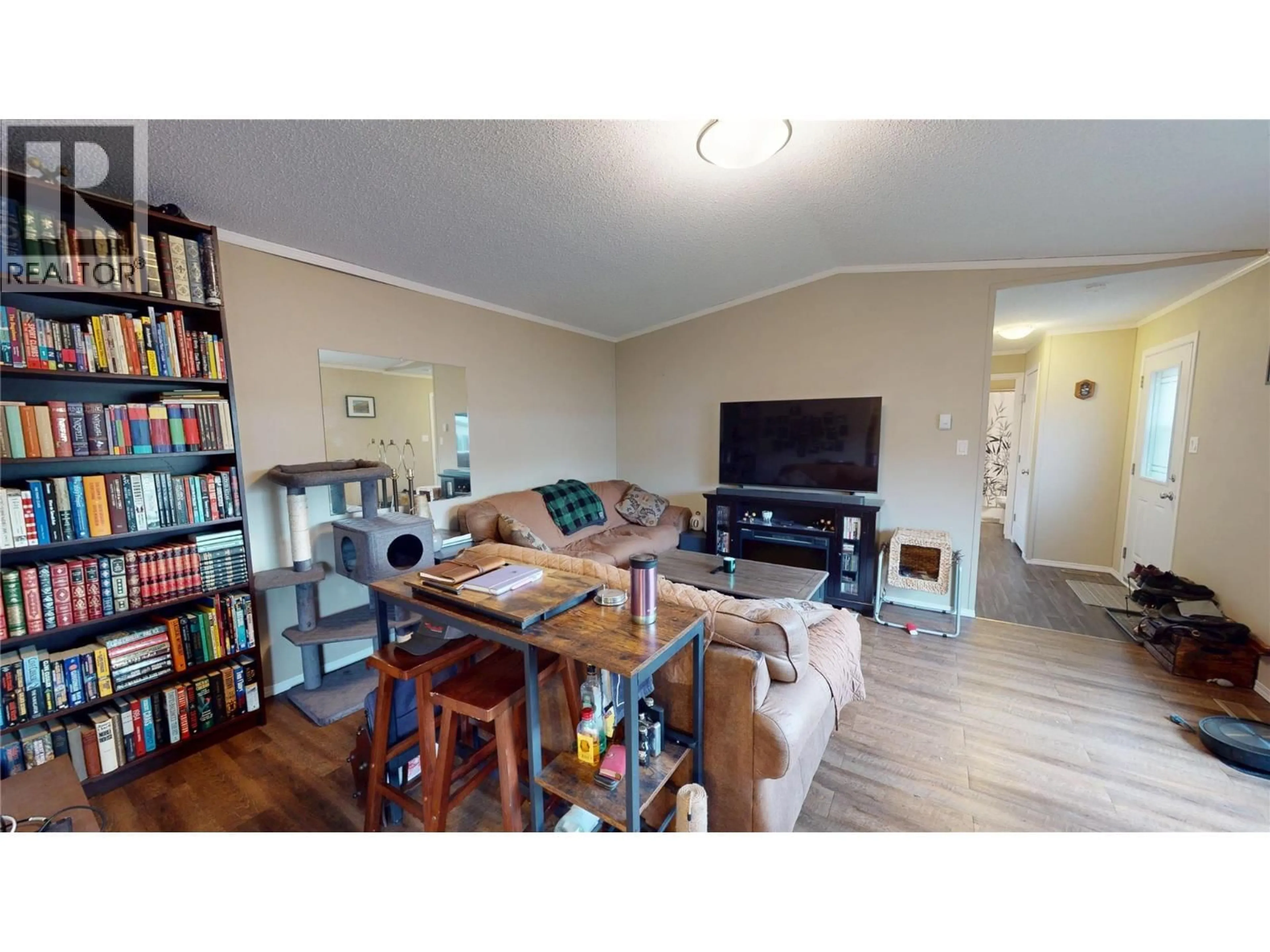 Living room with furniture, wood/laminate floor for 55 - 100 INDUSTRIAL #1 ROAD, Sparwood British Columbia V0B2G1