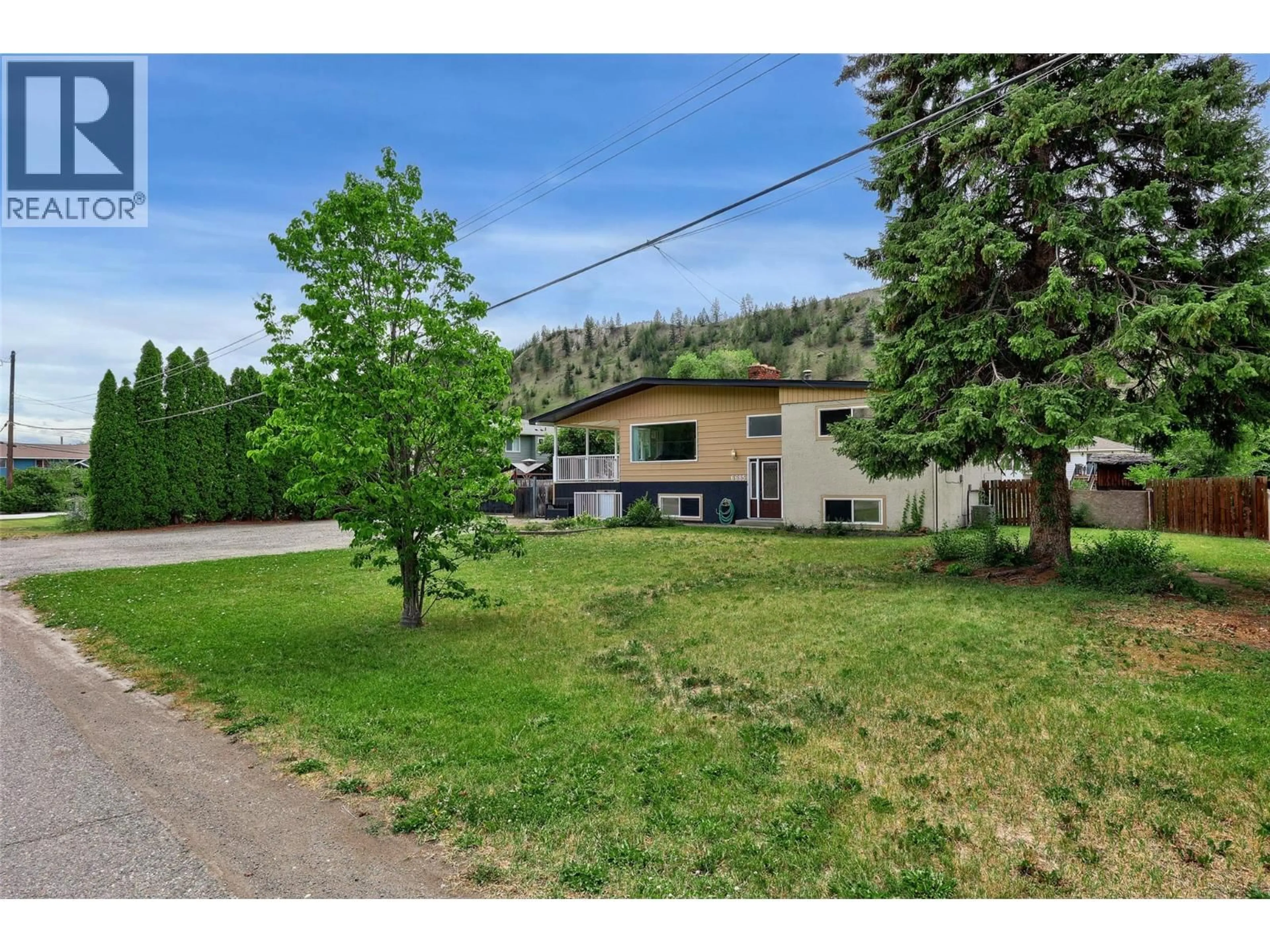 A pic from outside/outdoor area/front of a property/back of a property/a pic from drone, mountain view for 6685 BEAVER CRESCENT, Kamloops British Columbia V2C4B2