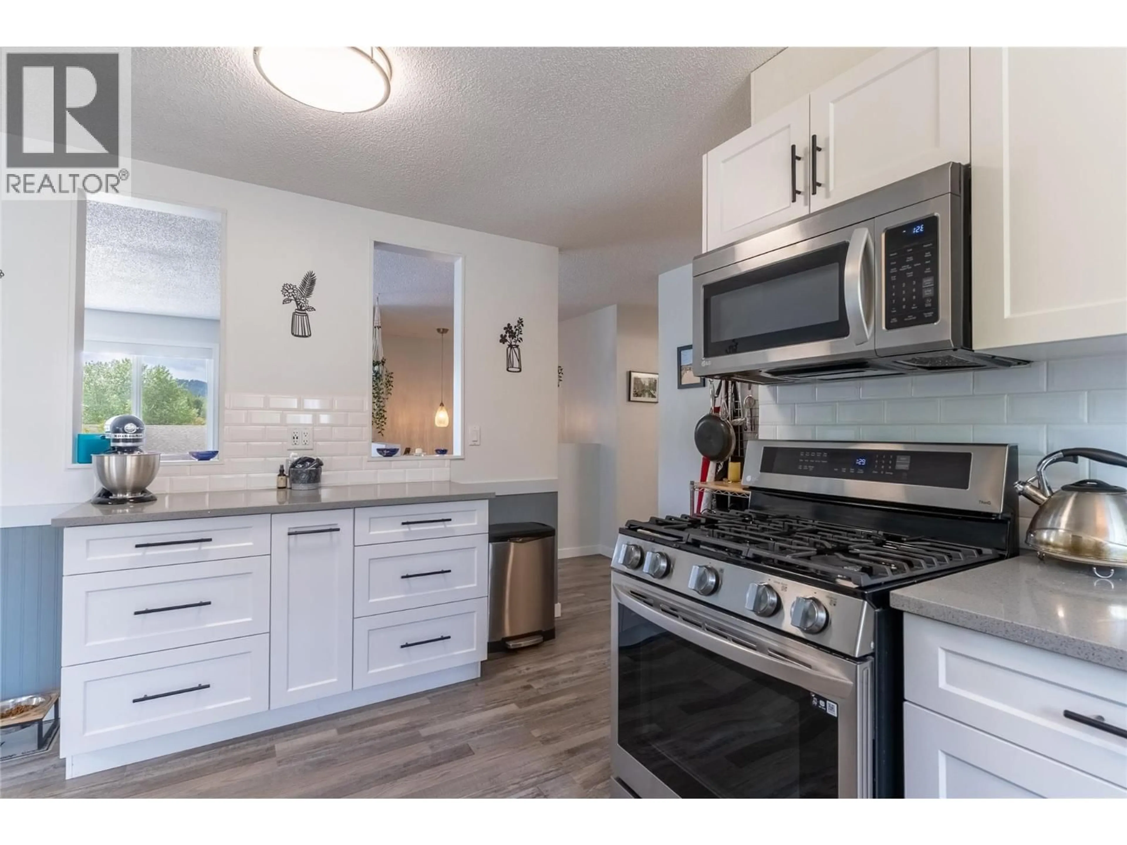 Open concept kitchen, unknown for 144 BIRCH CRESCENT, Logan Lake British Columbia V0K1W0