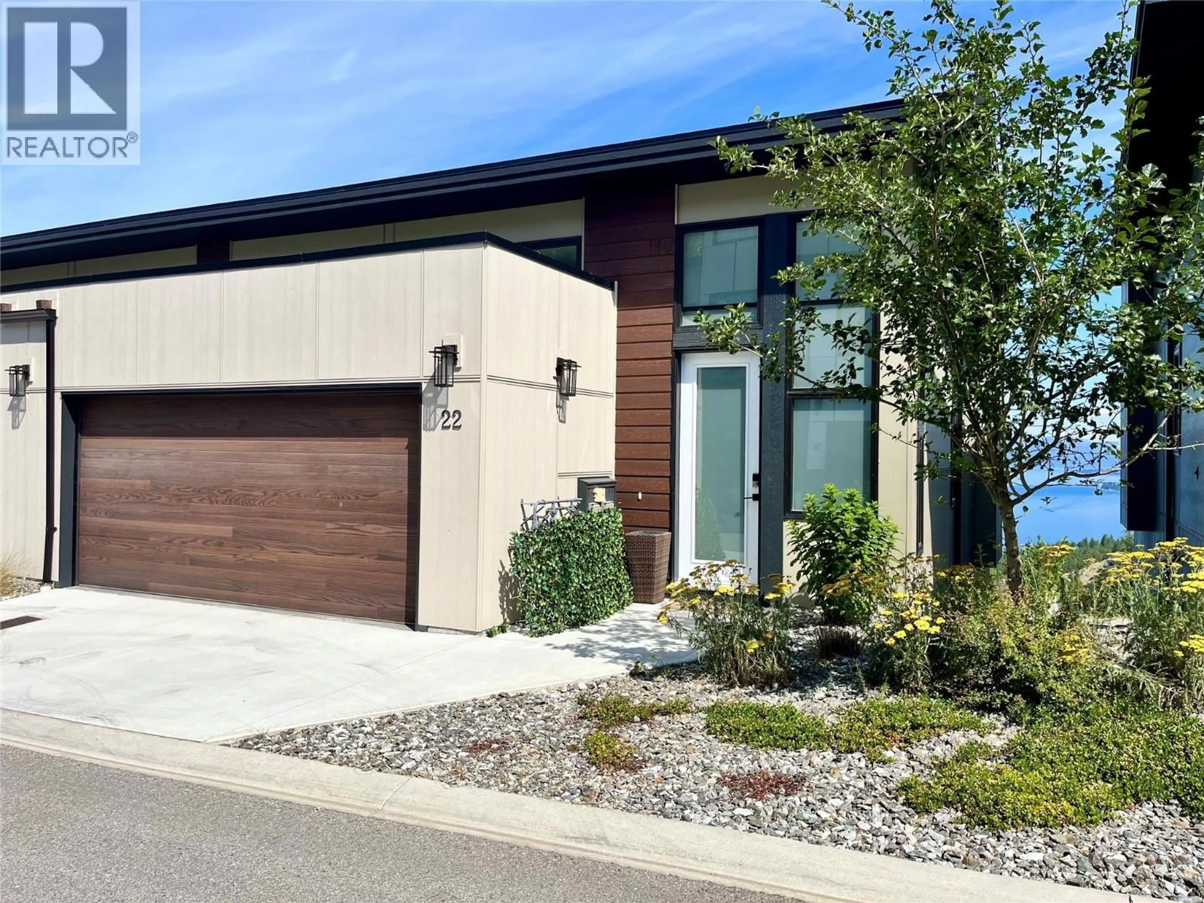 Home with brick exterior material, street for 22 - 3220 HILLTOWN DRIVE, Kelowna British Columbia V1V0C6