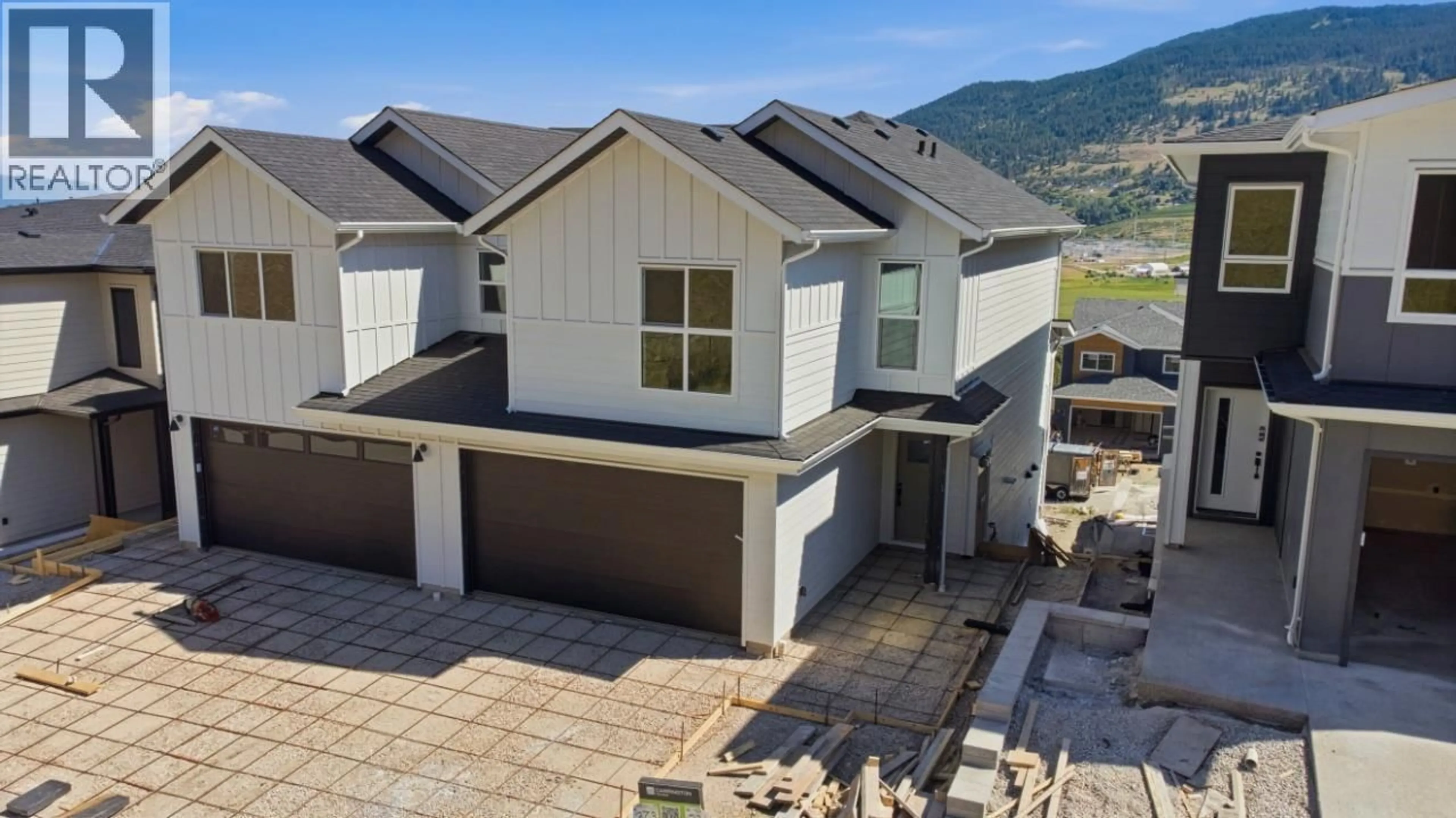 A pic from outside/outdoor area/front of a property/back of a property/a pic from drone, mountain view for 377 ARROWLEAF RISE, Coldstream British Columbia V1B0B5