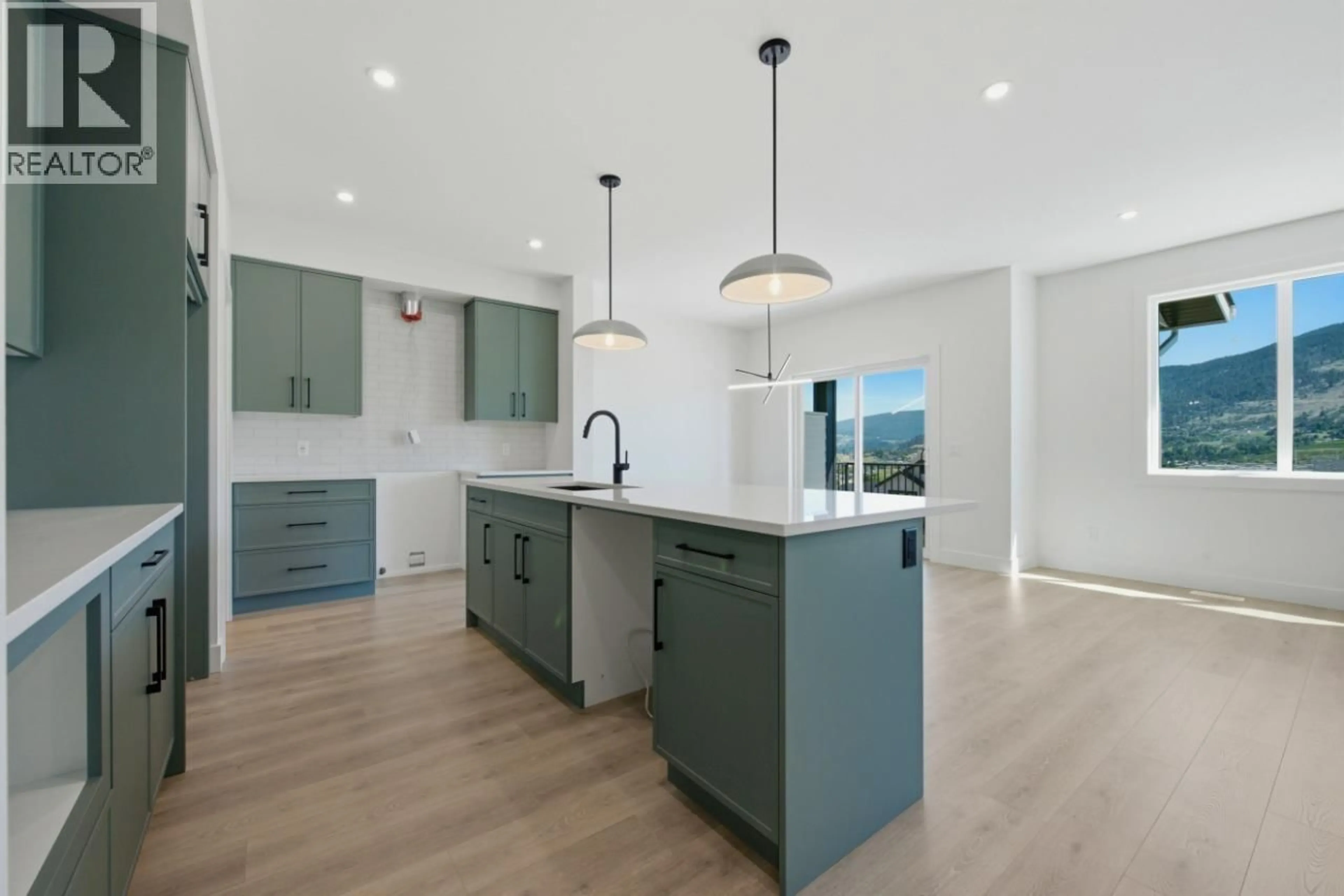 Open concept kitchen, unknown for 377 ARROWLEAF RISE, Coldstream British Columbia V1B0B5