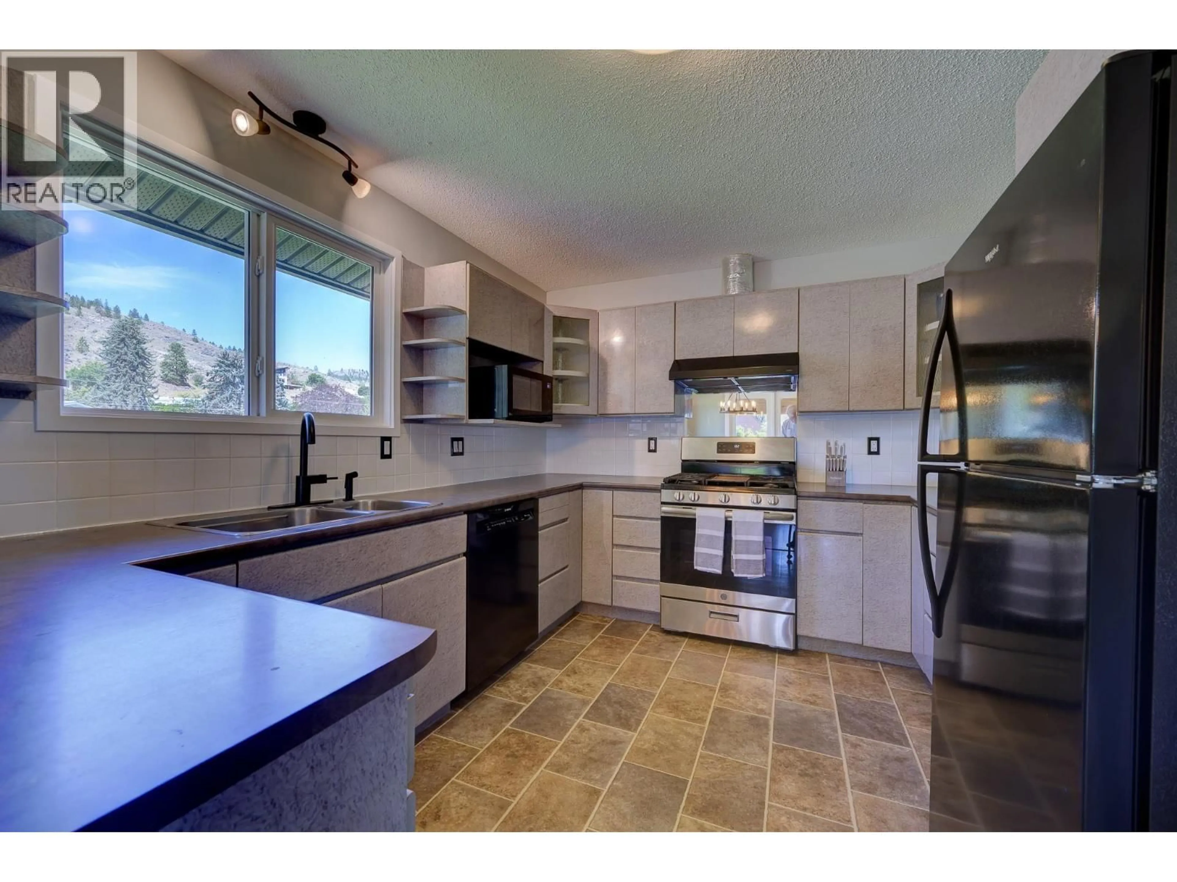 Open concept kitchen, ceramic/tile floor for 870 SUMAC PLACE, Kamloops British Columbia V2B6R4