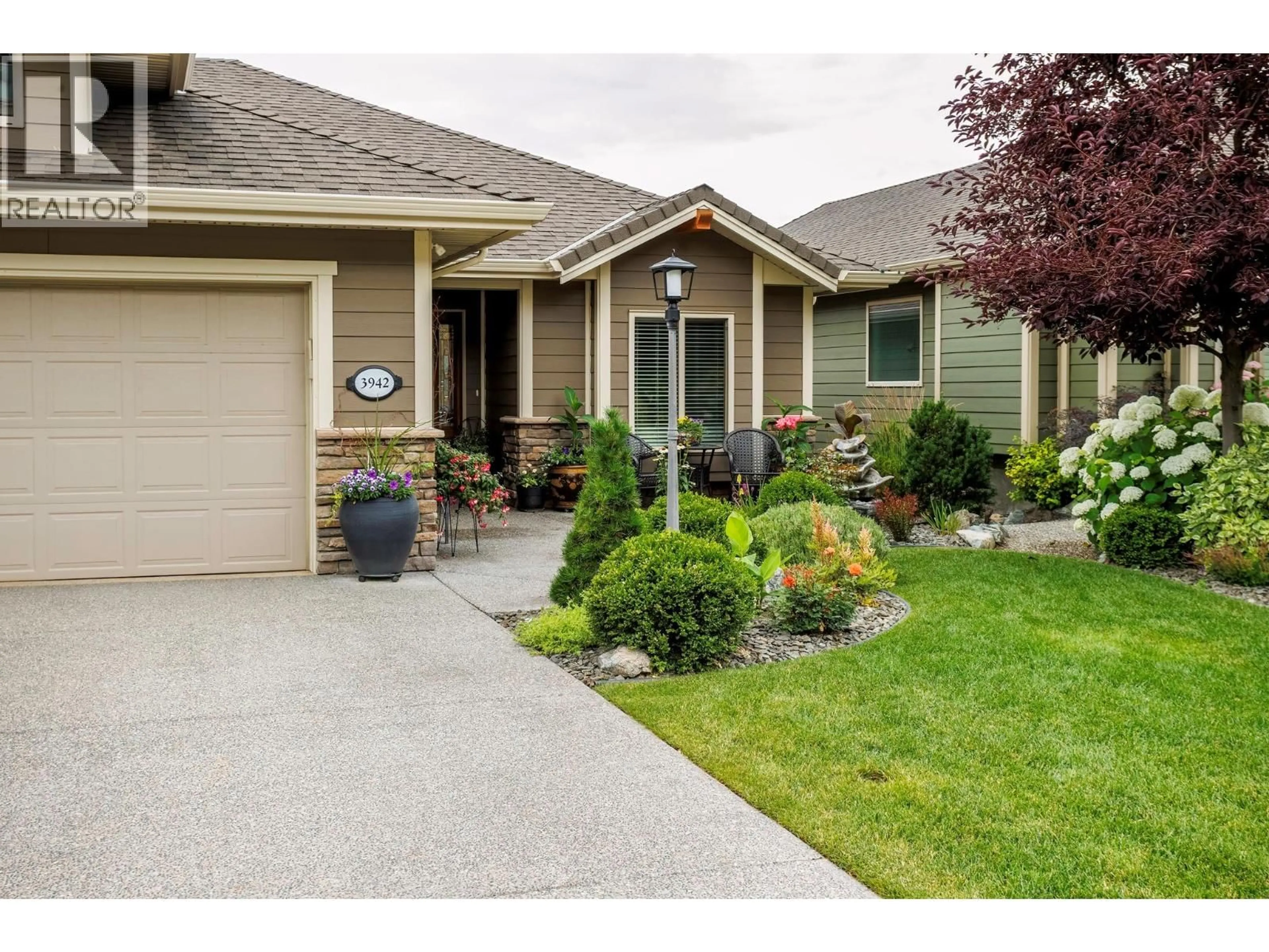 Home with vinyl exterior material, street for 3942 PINE VALLEY DRIVE, Kelowna British Columbia V1X8E5