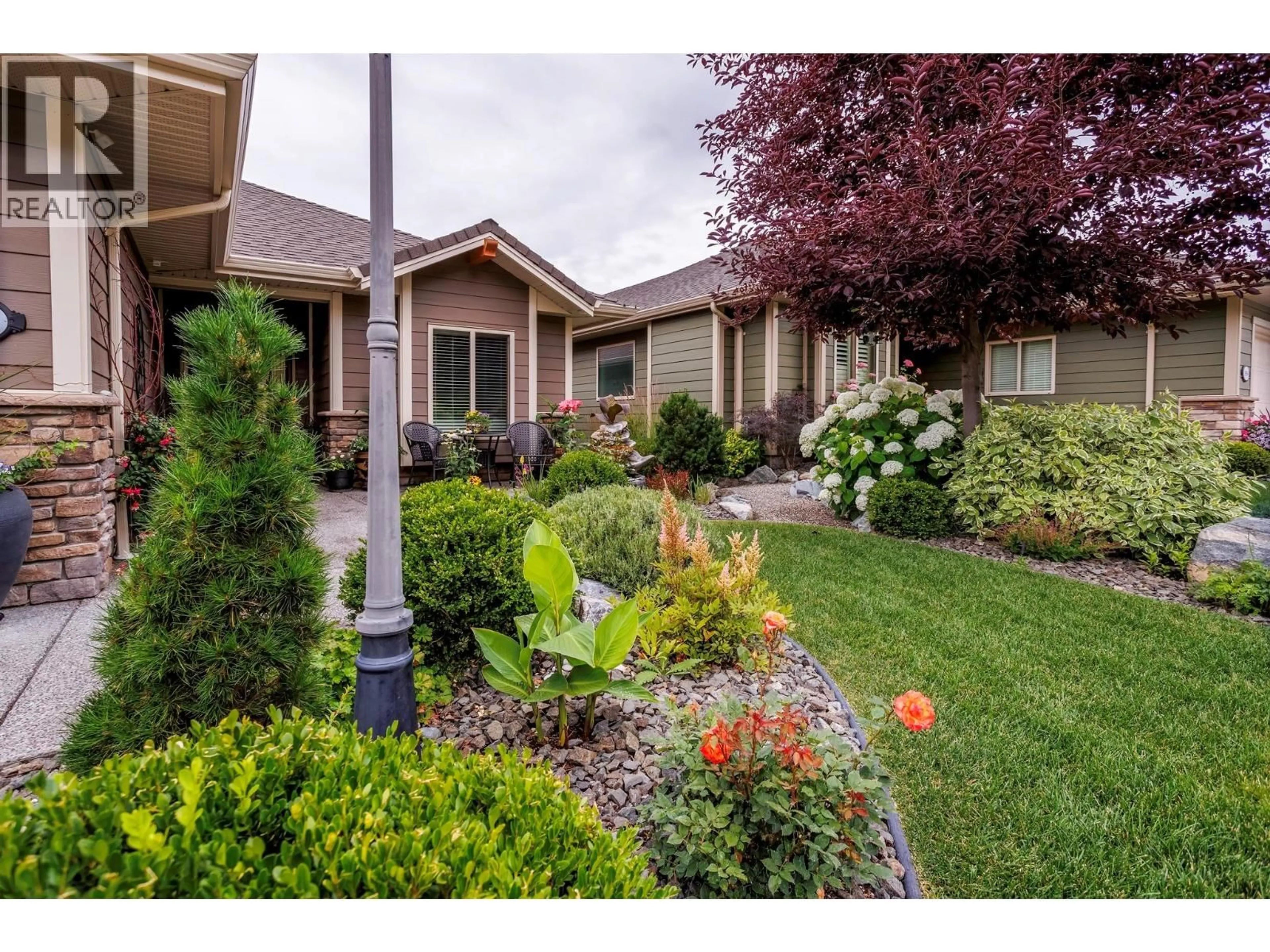 Home with vinyl exterior material, street for 3942 PINE VALLEY DRIVE, Kelowna British Columbia V1X8E5