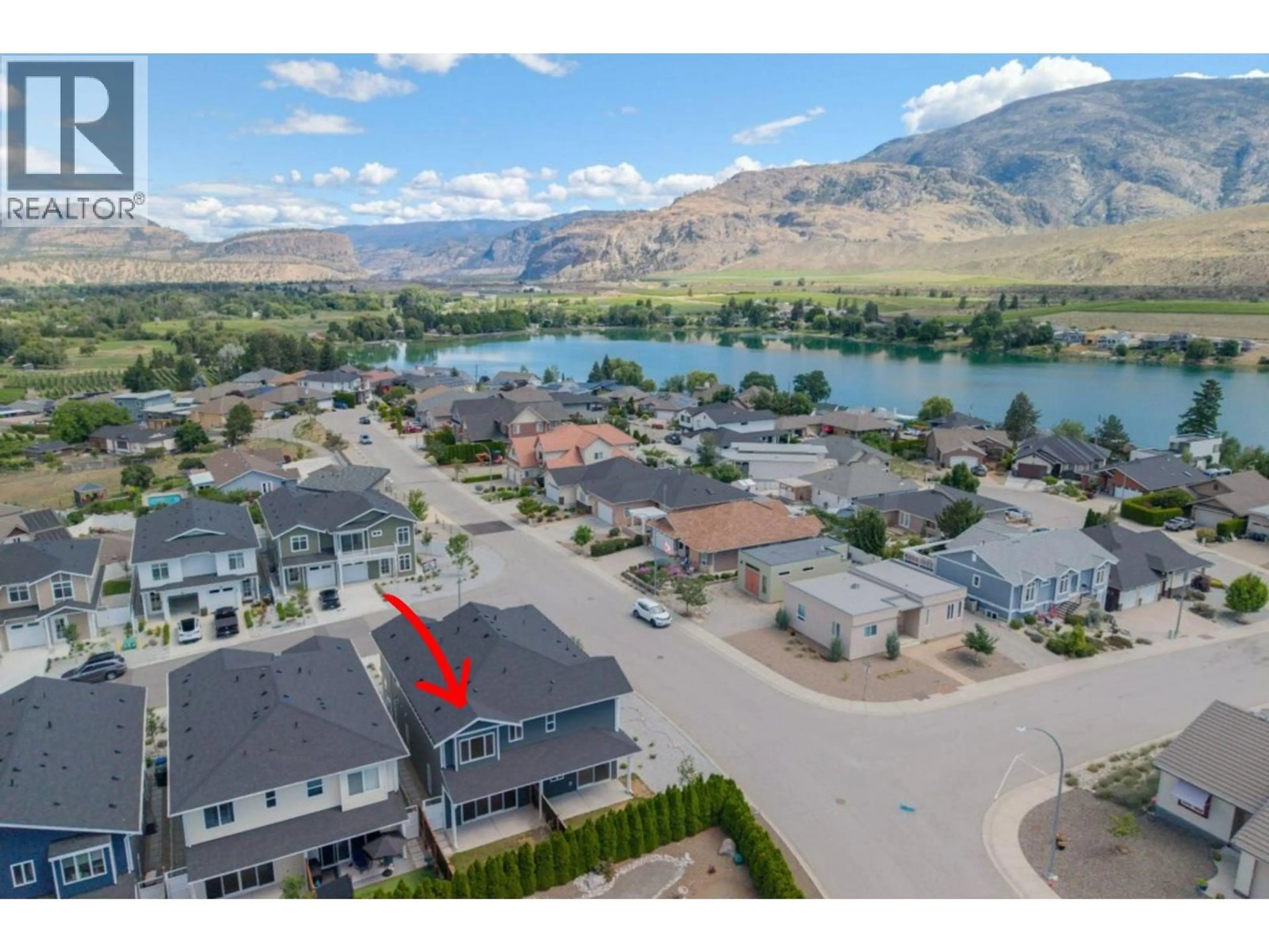 A pic from outside/outdoor area/front of a property/back of a property/a pic from drone, water/lake/river/ocean view for 395 CHARDONNAY AVENUE, Oliver British Columbia V0H1T4