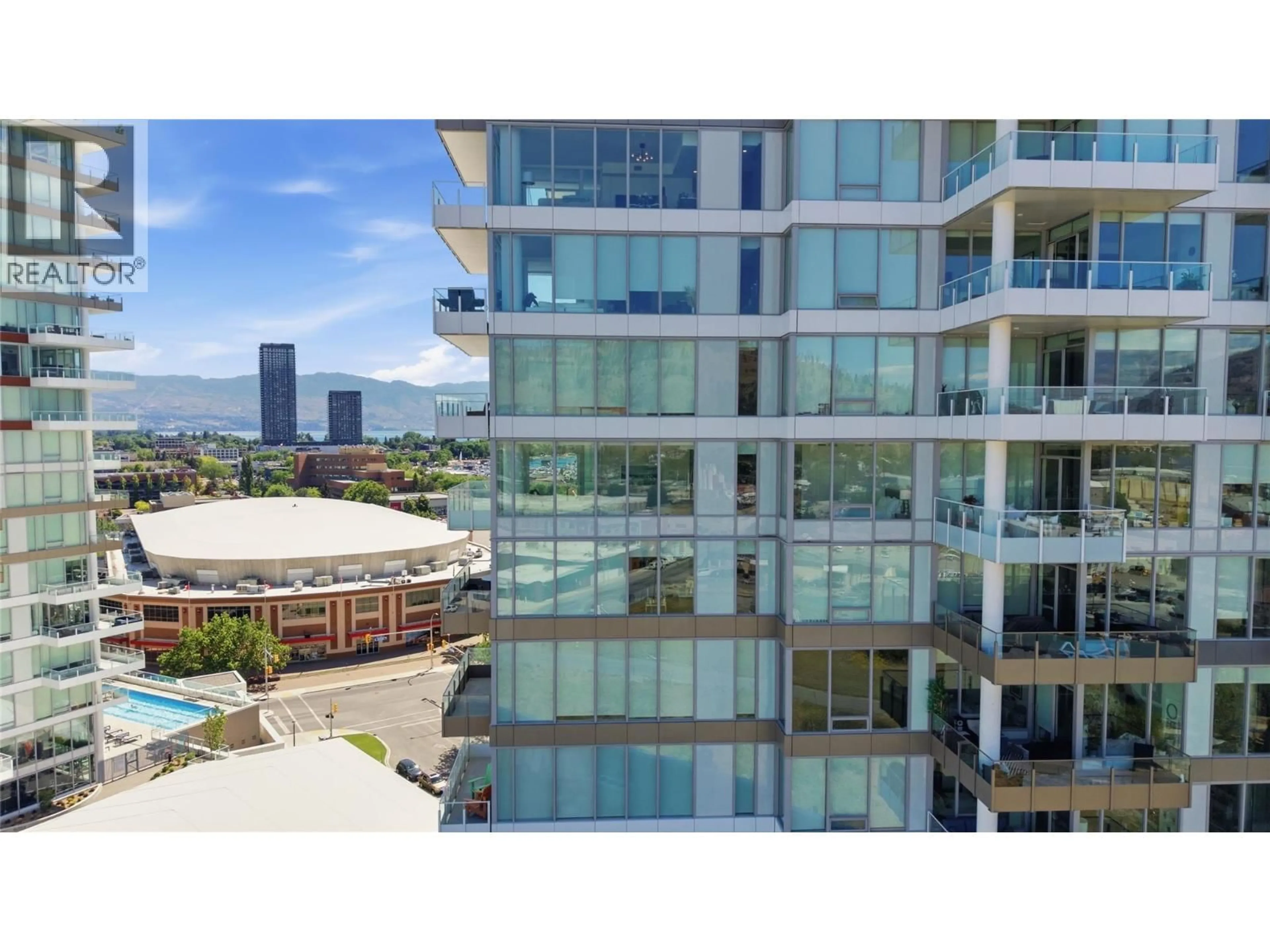 A pic from outside/outdoor area/front of a property/back of a property/a pic from drone, city buildings view from balcony for 1202 - 1181 SUNSET DRIVE, Kelowna British Columbia V1Y0J4