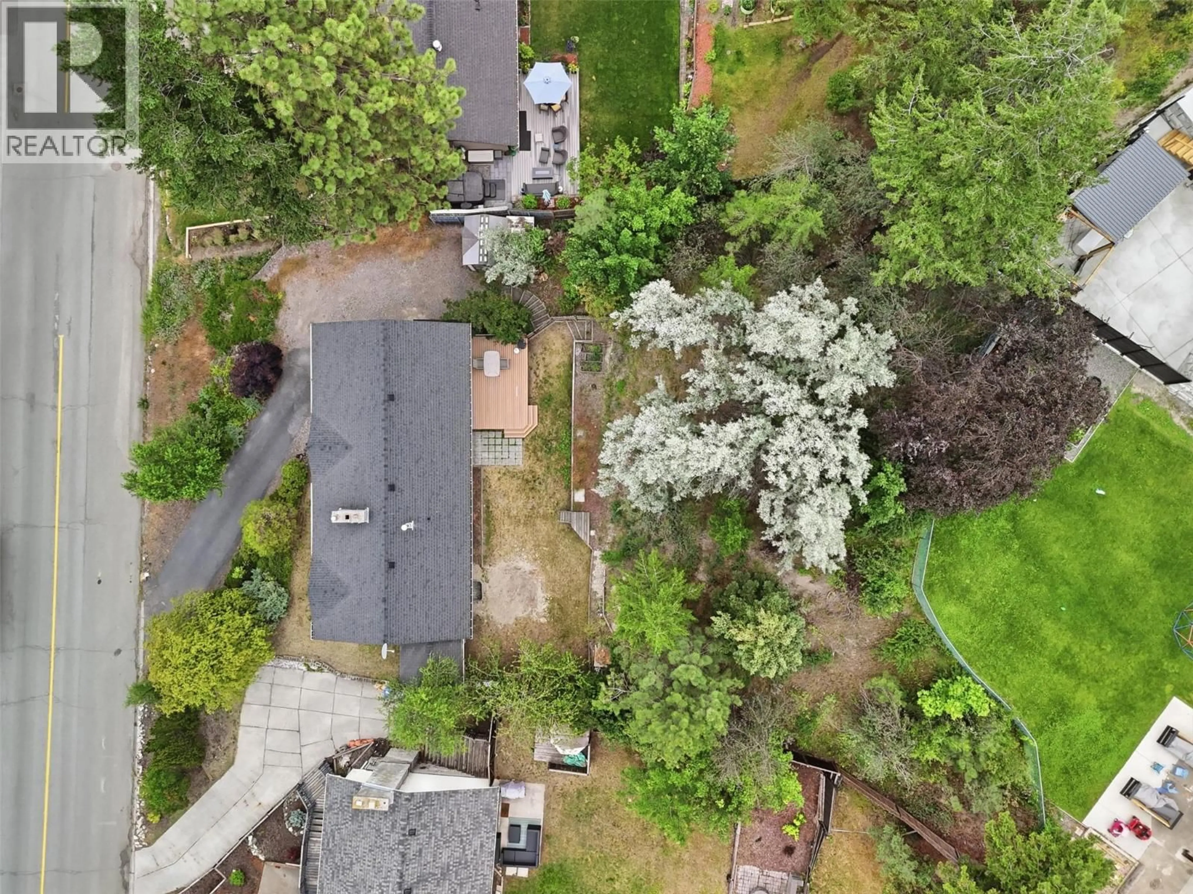 A pic from outside/outdoor area/front of a property/back of a property/a pic from drone, forest/trees view for 1871 SPRINGHILL DRIVE, Kamloops British Columbia V2E1J2
