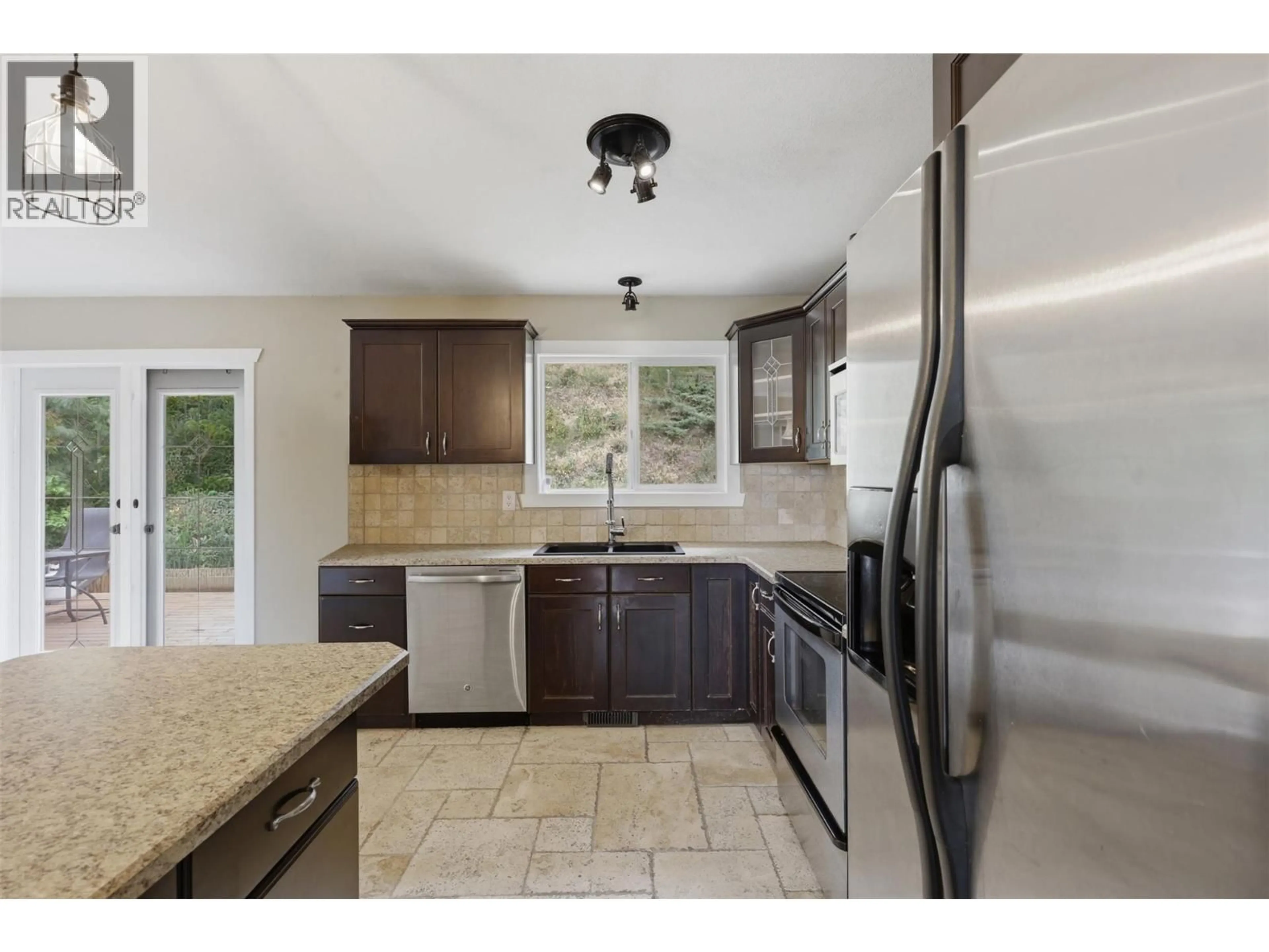 Open concept kitchen, ceramic/tile floor for 1871 SPRINGHILL DRIVE, Kamloops British Columbia V2E1J2