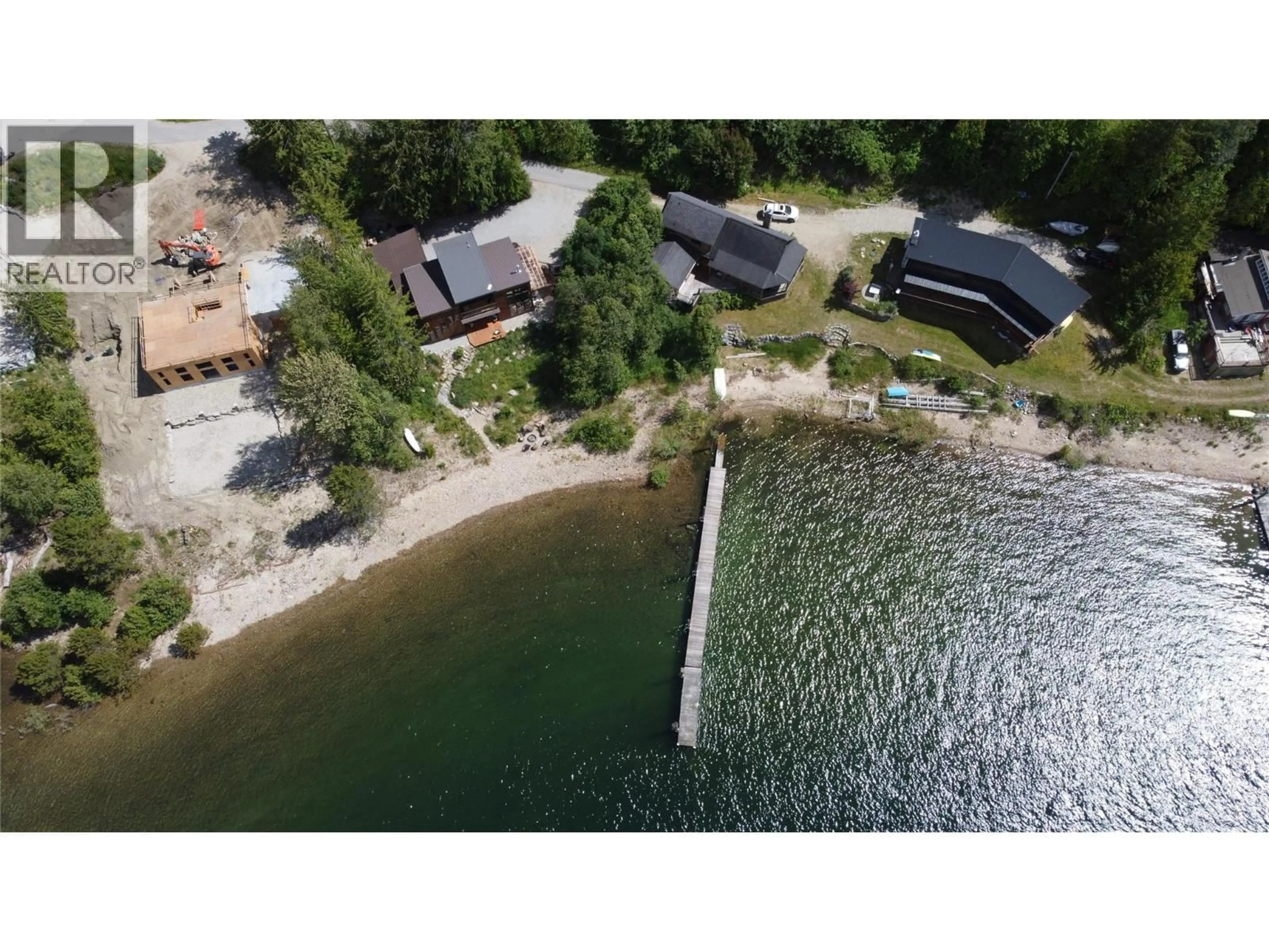 A pic from outside/outdoor area/front of a property/back of a property/a pic from drone, water/lake/river/ocean view for 113 KOOTENAY LAKE ROAD, Procter British Columbia V0G1V0