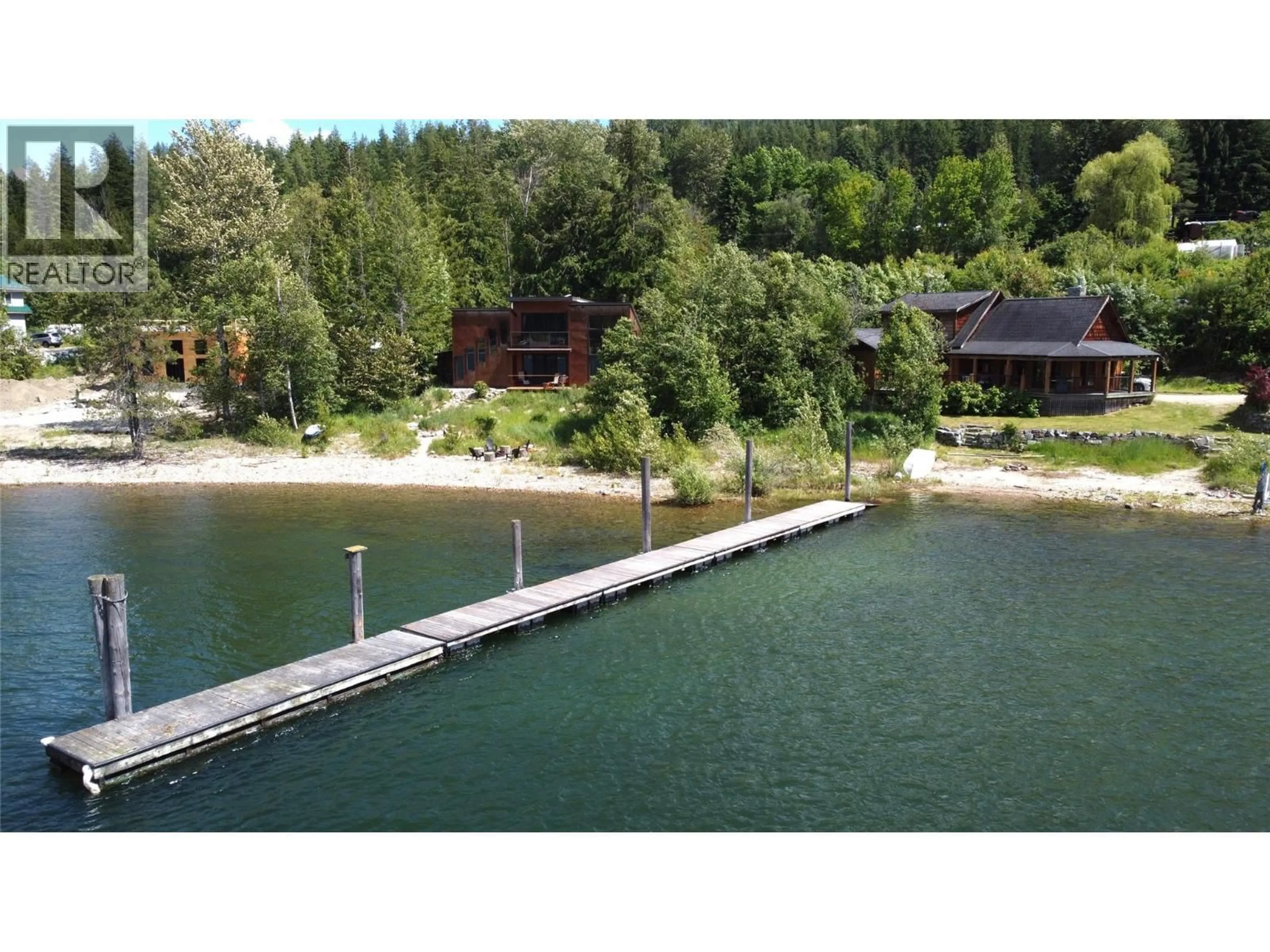A pic from outside/outdoor area/front of a property/back of a property/a pic from drone, water/lake/river/ocean view for 113 KOOTENAY LAKE ROAD, Procter British Columbia V0G1V0