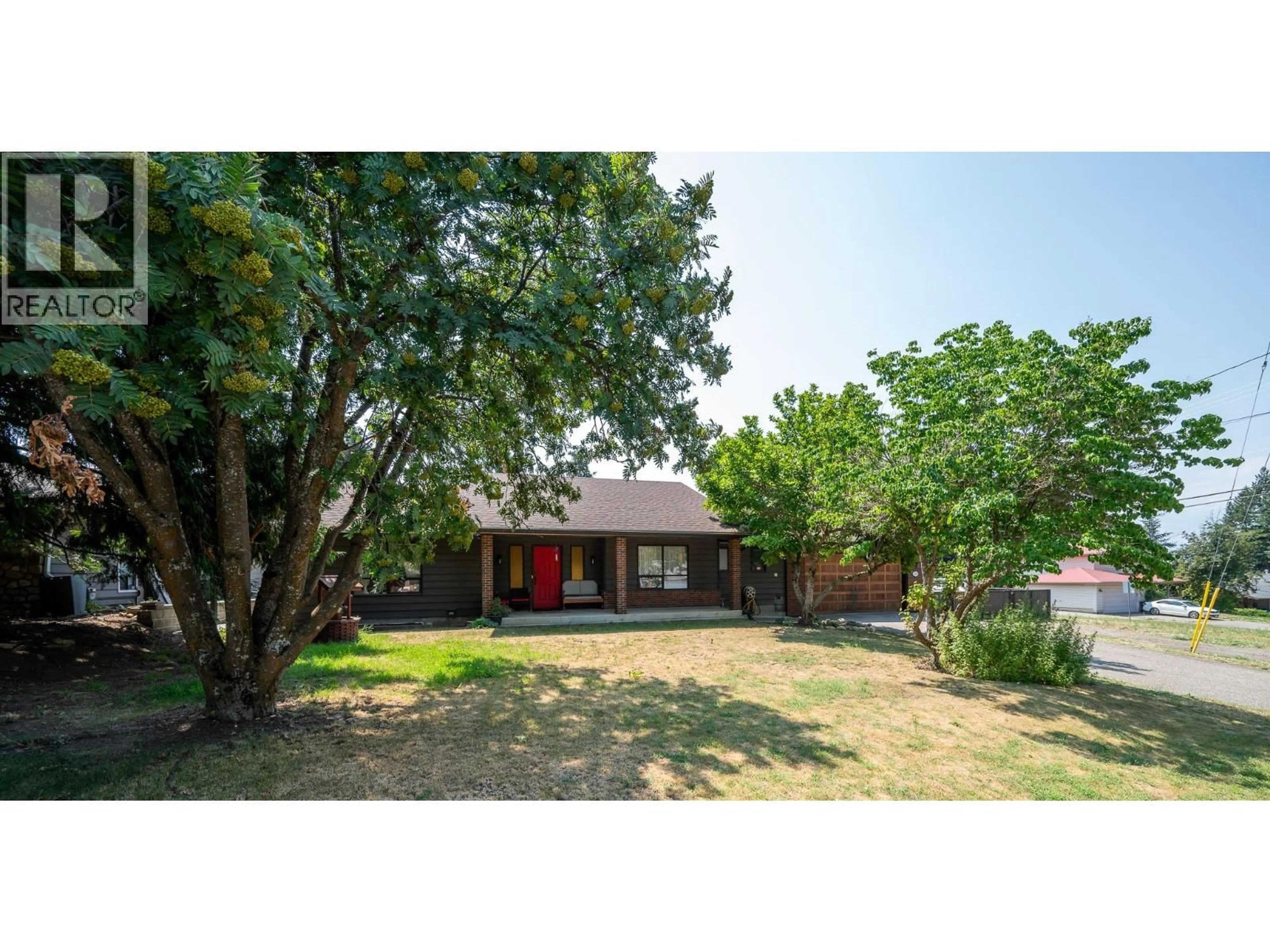 A pic from outside/outdoor area/front of a property/back of a property/a pic from drone, street for 610 LARKSPUR ROAD ROAD, Vernon British Columbia V1B3J2