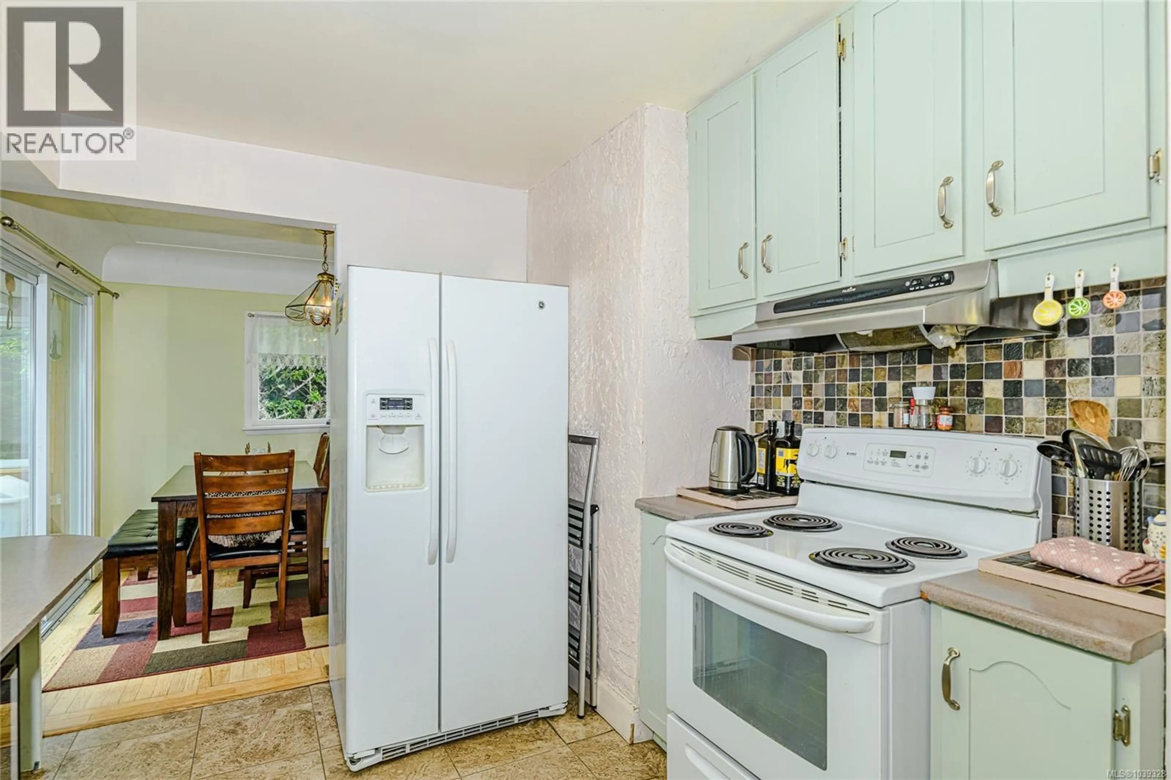 Standard kitchen, ceramic/tile floor for 3803 MERRIMAN DRIVE, Saanich British Columbia V8P2S9