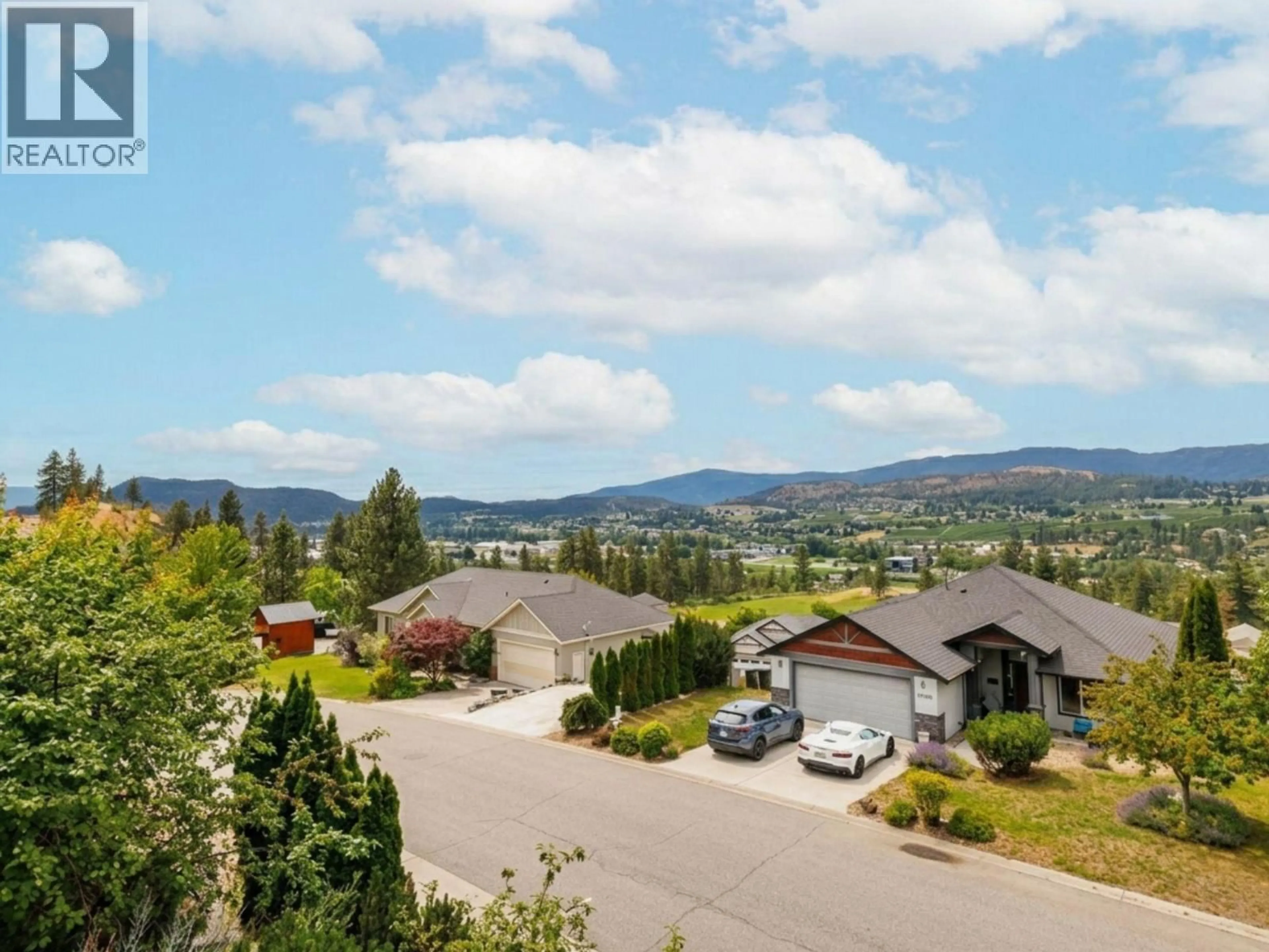A pic from outside/outdoor area/front of a property/back of a property/a pic from drone, mountain view for 10349 COPPER HILL LANE, Lake Country British Columbia V4V2P3