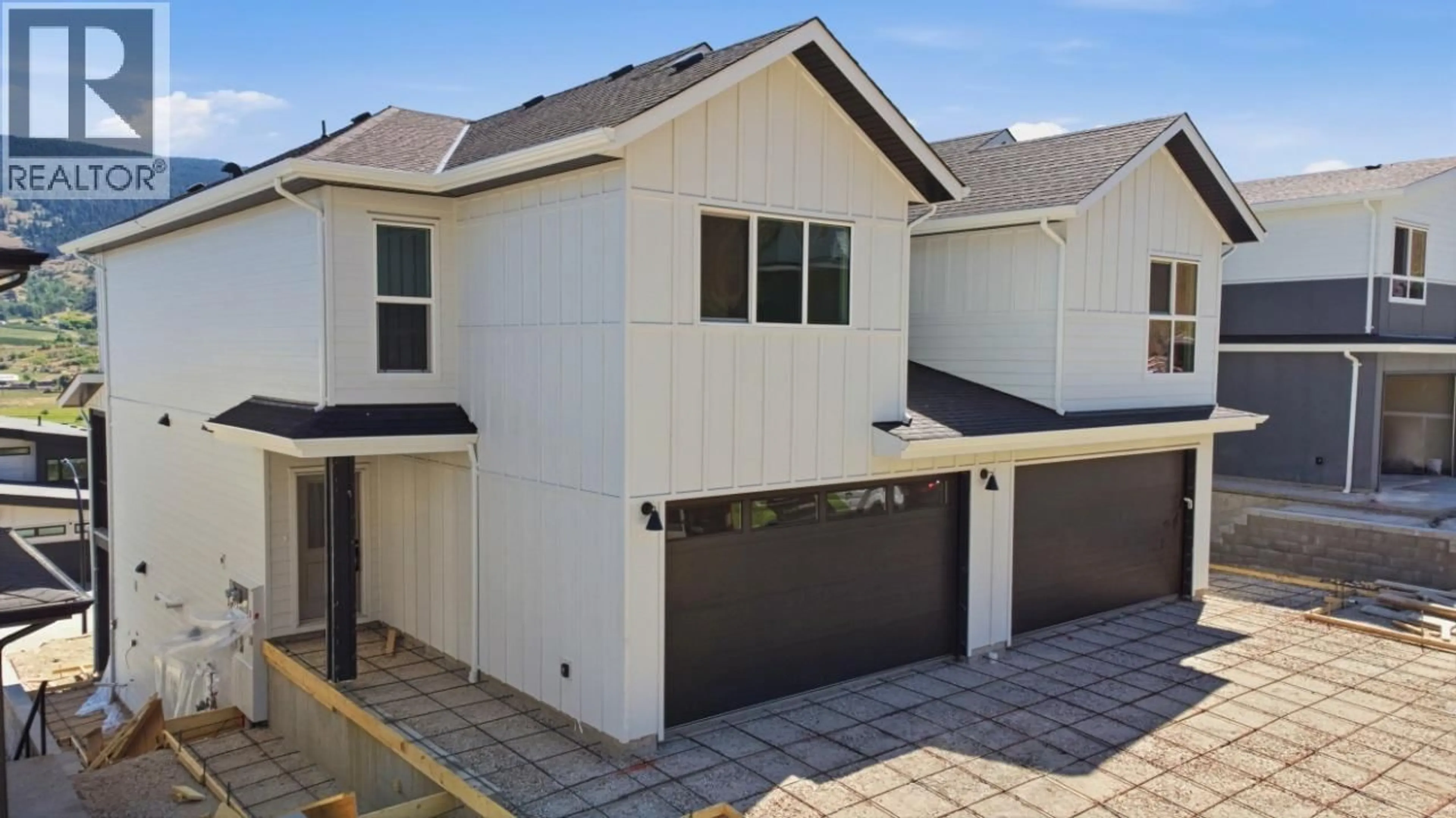 Home with vinyl exterior material, street for 373 ARROWLEAF RISE, Coldstream British Columbia V1B0B5