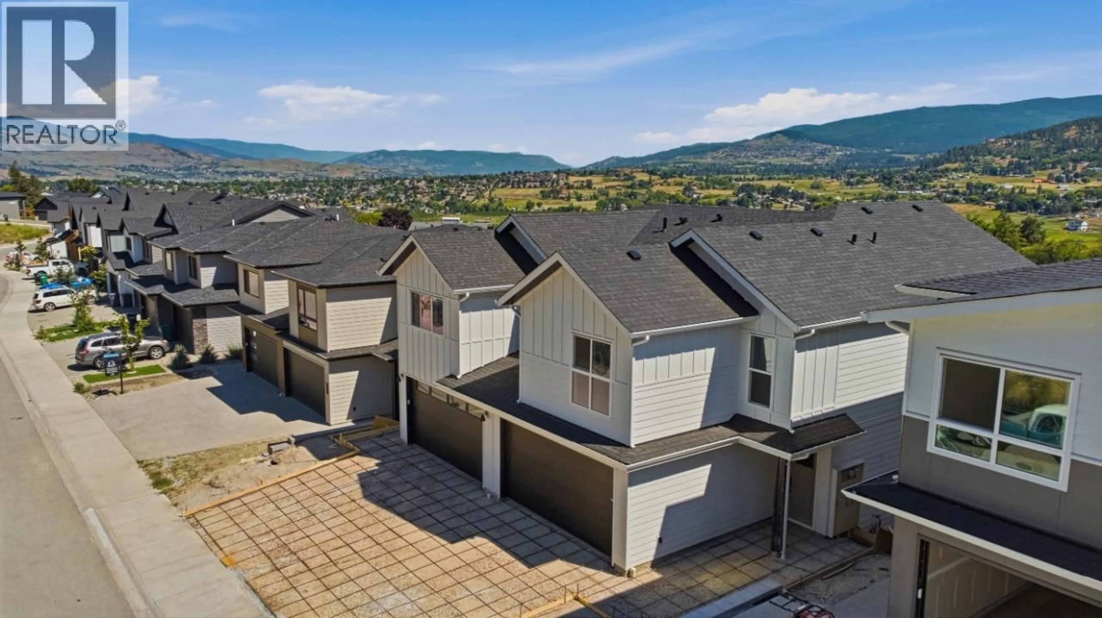 A pic from outside/outdoor area/front of a property/back of a property/a pic from drone, mountain view for 373 ARROWLEAF RISE, Coldstream British Columbia V1B0B5
