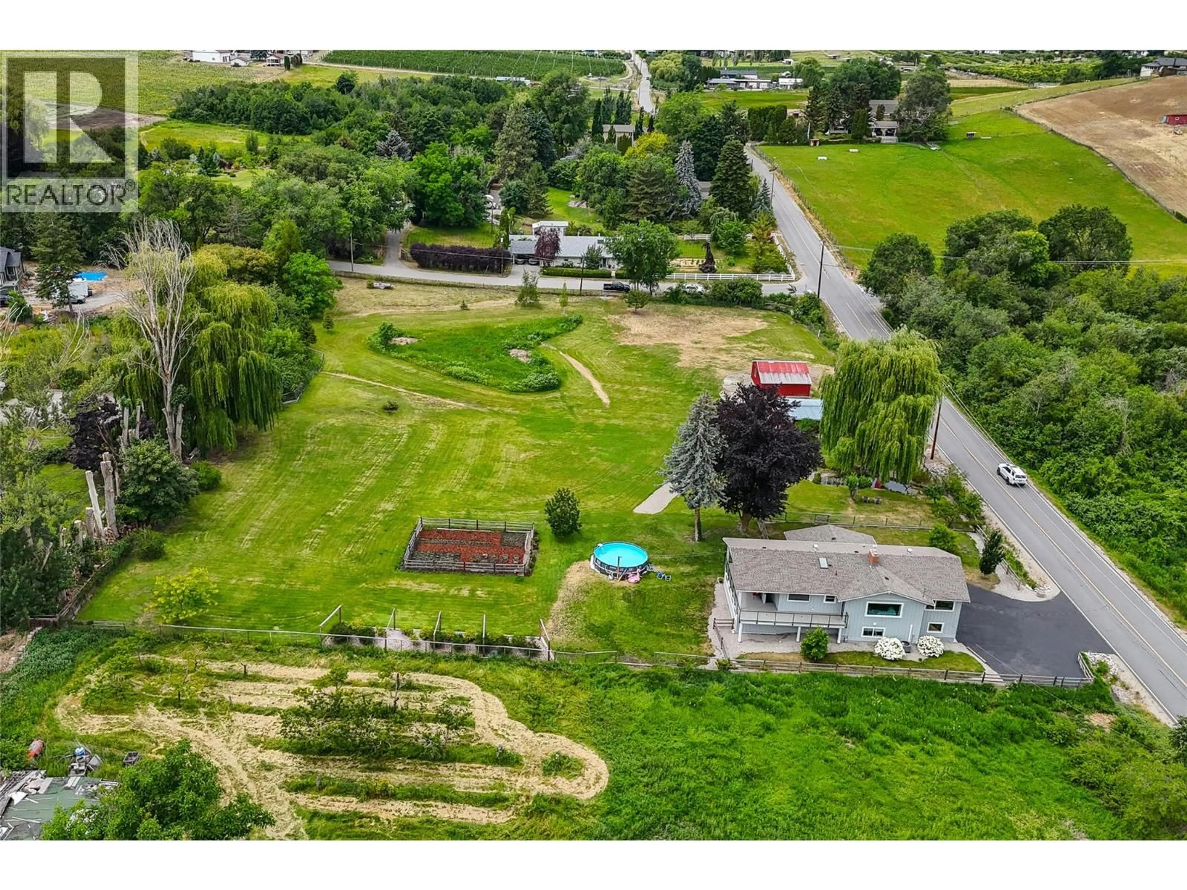 A pic from outside/outdoor area/front of a property/back of a property/a pic from drone, water/lake/river/ocean view for 12509 DALE MEADOWS ROAD, Summerland British Columbia V0H1Z8
